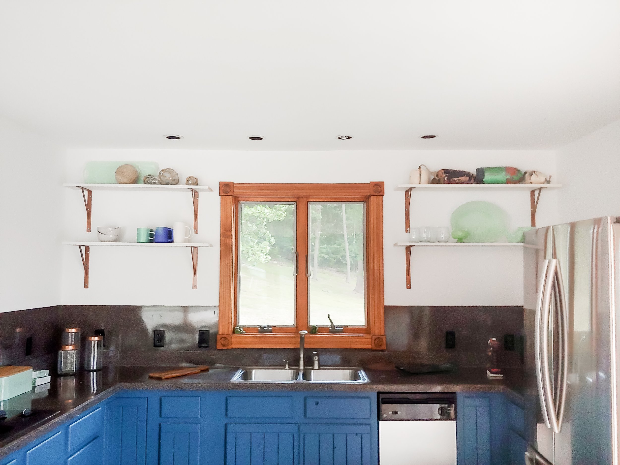 Cabinet paint, sourcing, decor and shelf install all done by me!