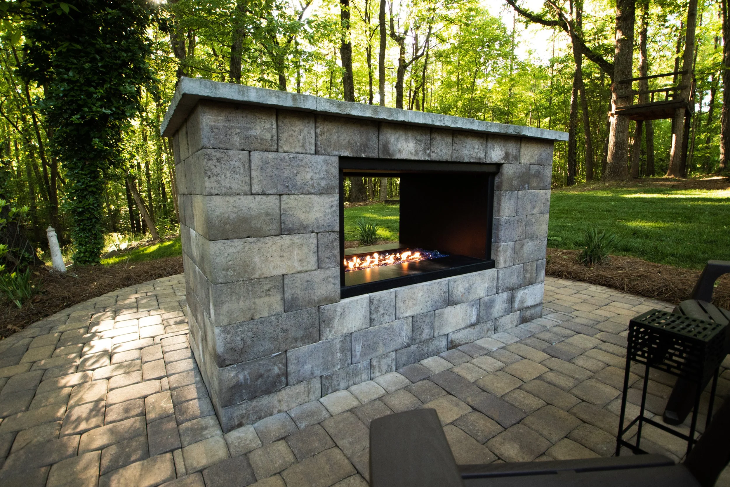 Standard outdoor fireplace installation by LOVING in Charlotte, NC.