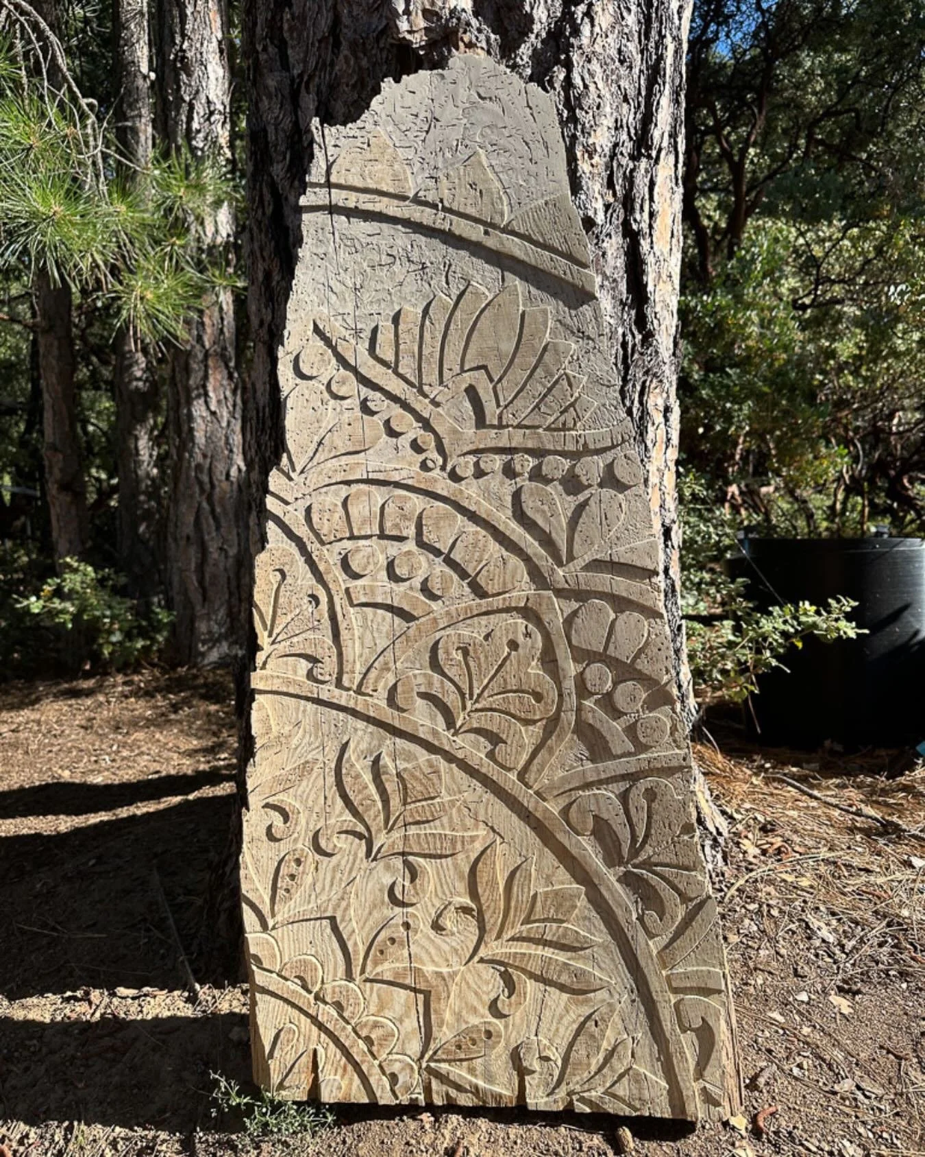 I initially approached working on scrap wood by trying to squeeze my design within its borders. This piece is the first time I decided to act as if the wood were a fragment of a larger artwork and allow the design to spill off the edges. This piece i