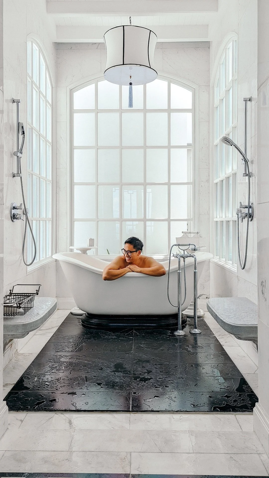 Gunnarolla sits in a luxurious bathtub at JW Marriott Phu Quoc, Vietnam