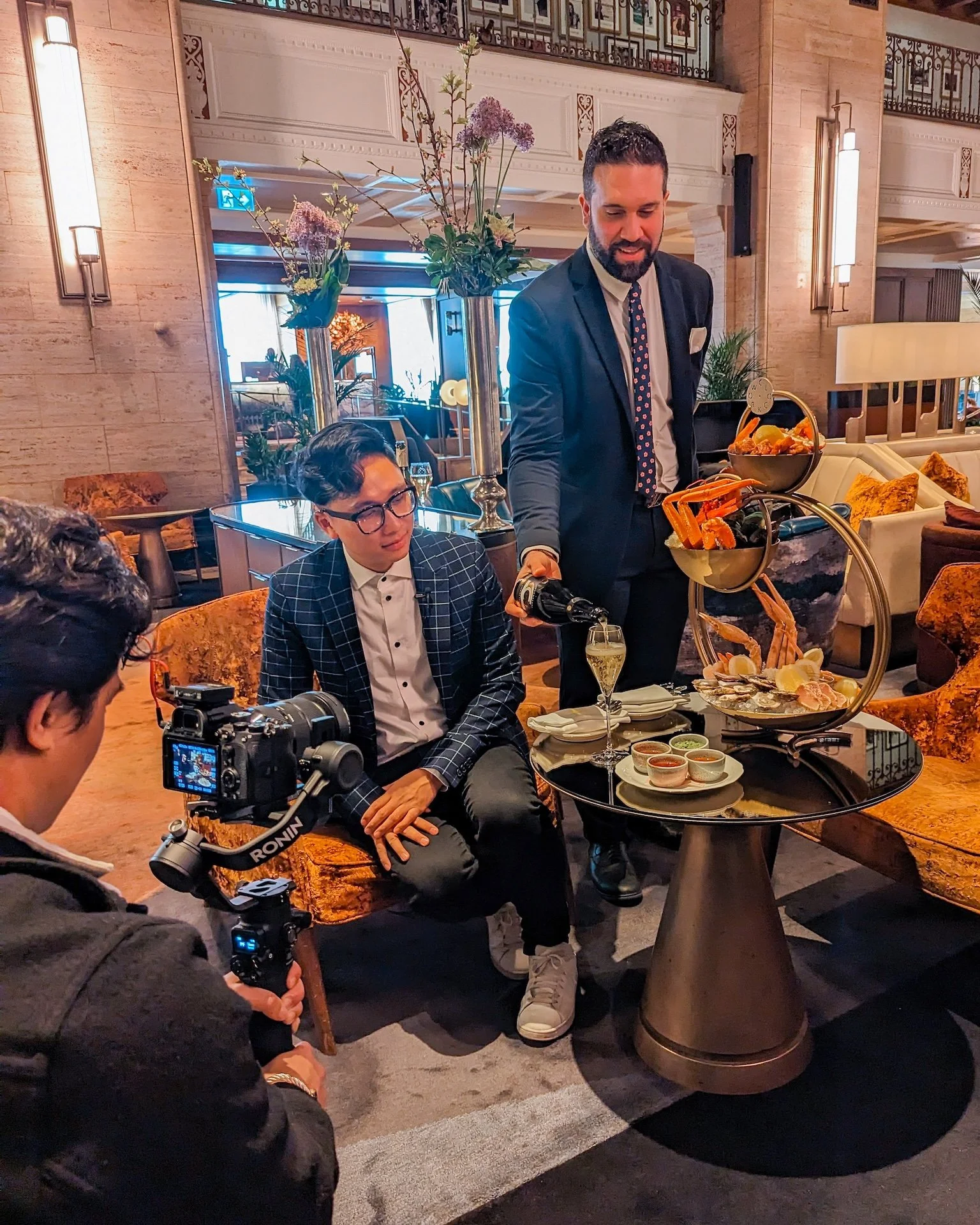 Behind the scenes of Gunnarolla recording a food segment at a luxury hotel