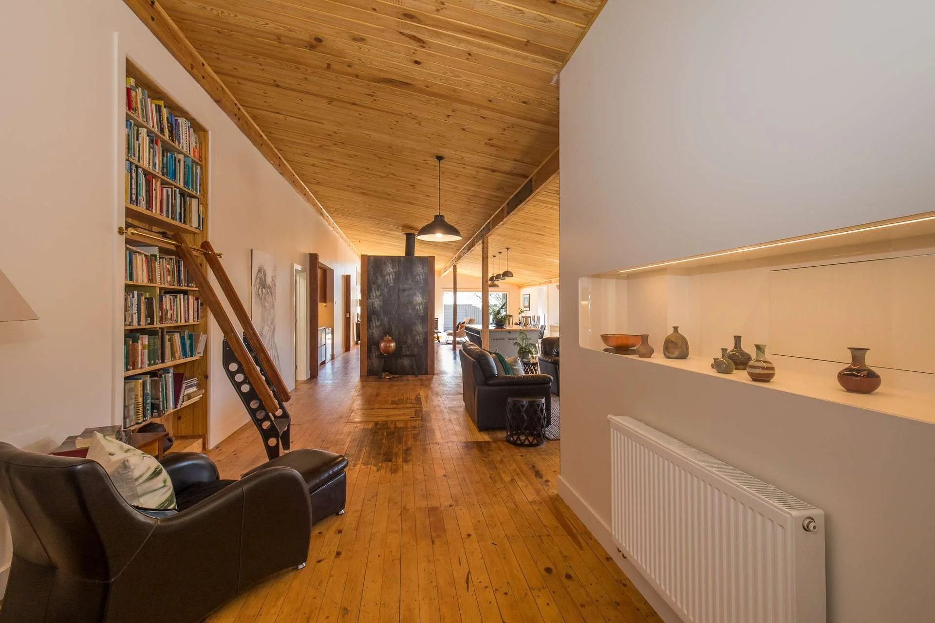 Interior of residential alteration project, foyer & gallery, exposed structural elements