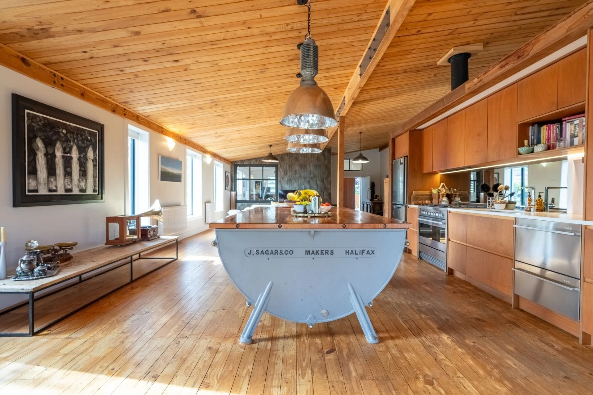 Interior of residential alteration project, open plan kitchen, dining, and living areas