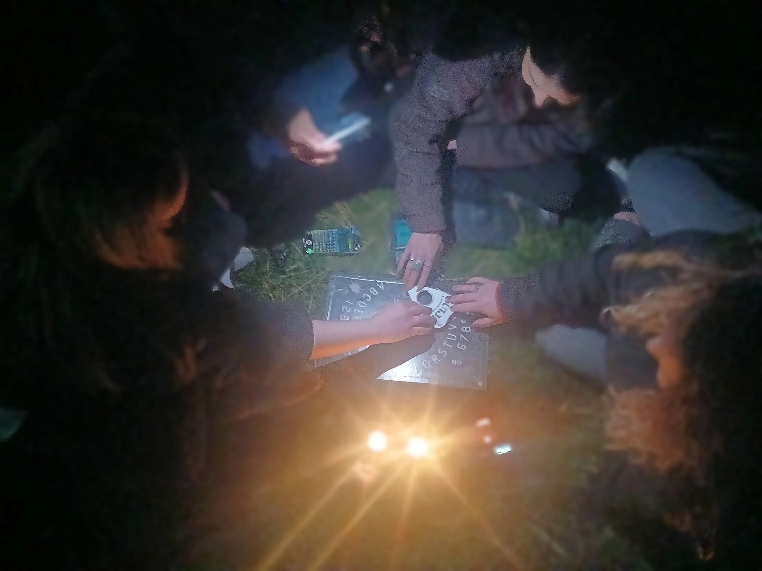 Ghost tour seance outdoors at Cheesman Park in Denver, CO.