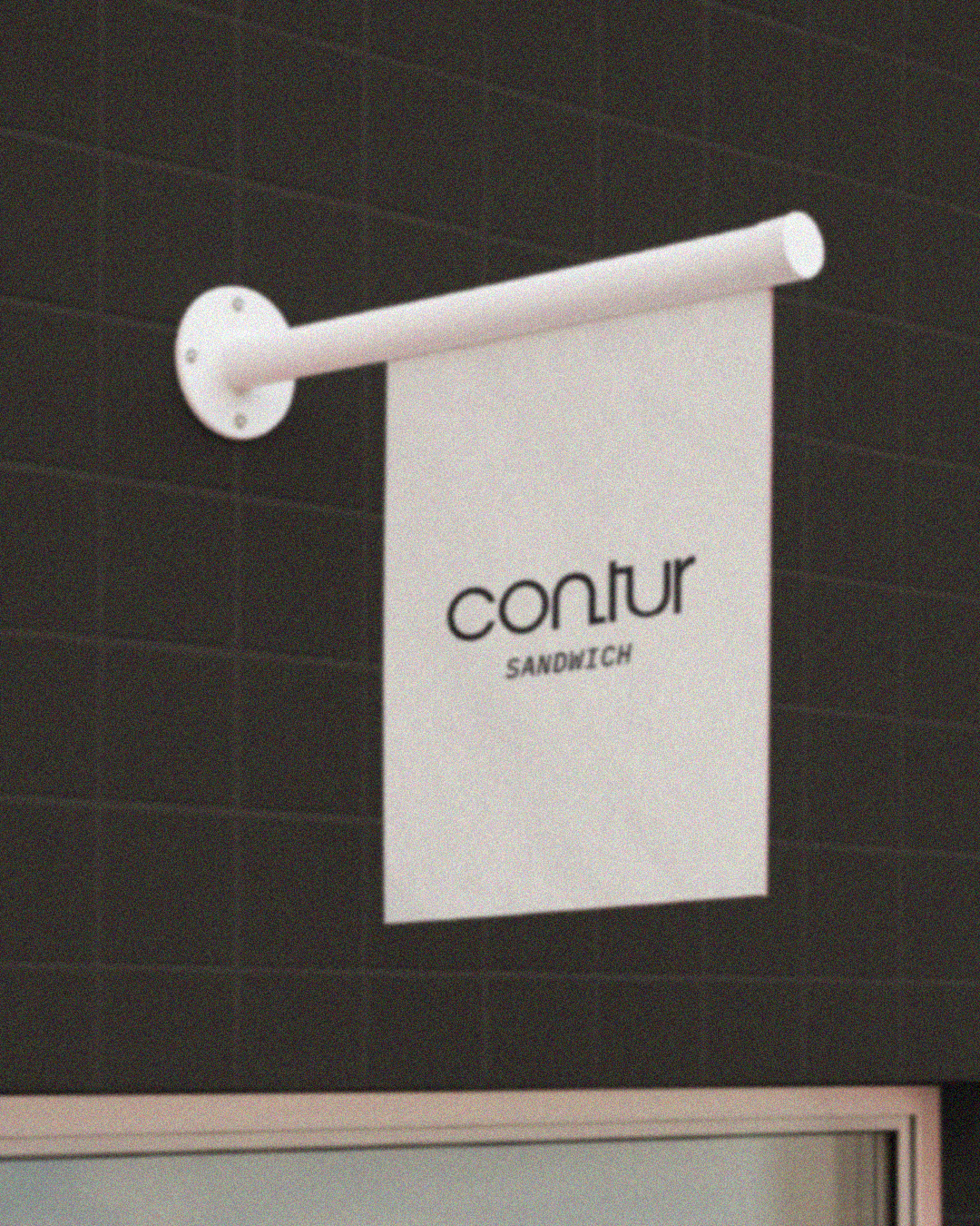 A white fabric banner with the words 'contur SANDWICH'