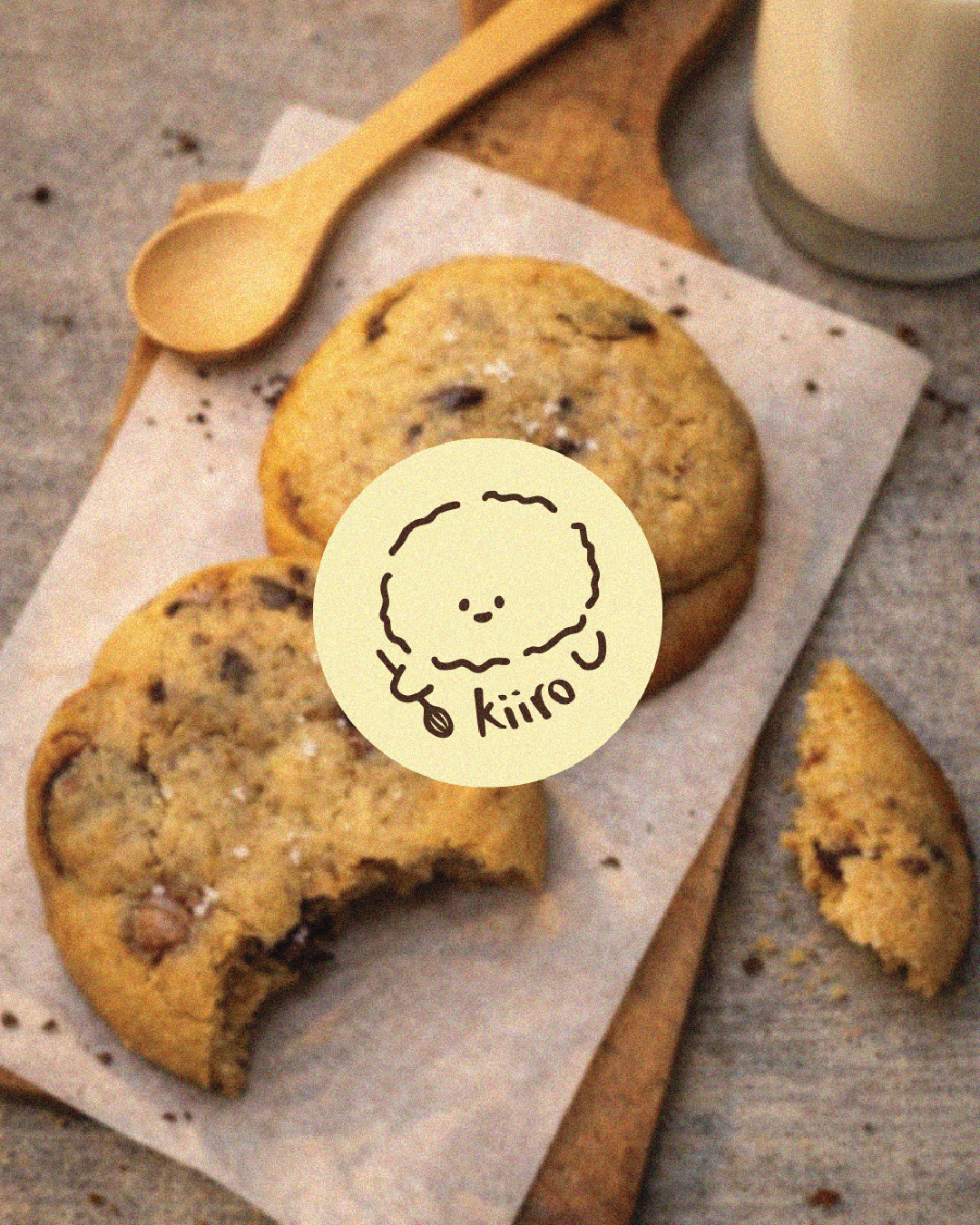 Two chocolate chip cookies labeled with kiiro logo