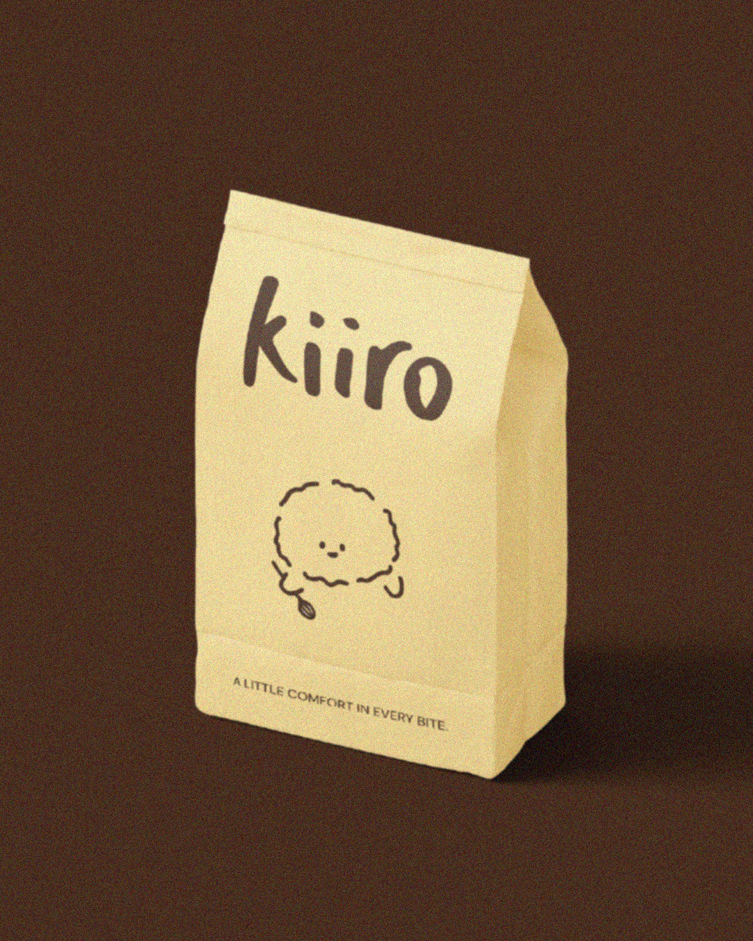 A yellow snack bag labeled 'kiiro' with a cute, simple illustration of a fluffy cake.