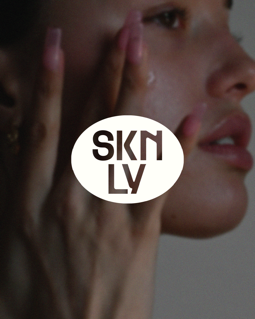 'SKNLY' logo in the center.