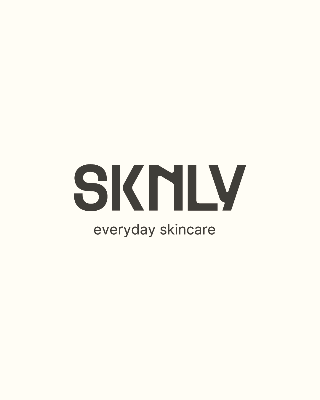 Minimalist skincare product logo with the word 'SKINLY'