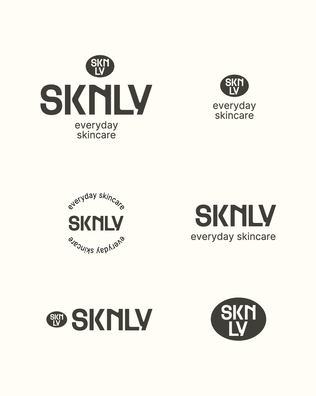 A display of various black and white logo designs for 'SKNLY', an everyday skincare brand, featuring different arrangements and fonts.