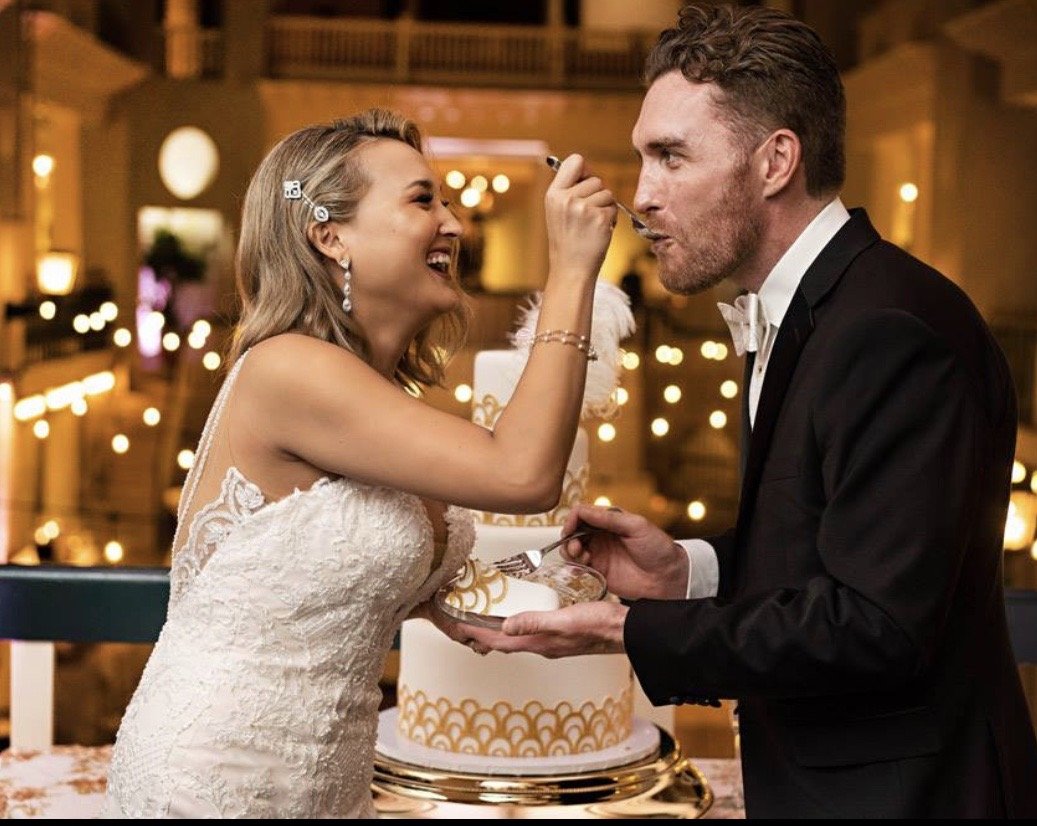 Classic white wedding cake for an intimate St. Augustine reception at the Lightner Museum by Sweet Weddings Cakes