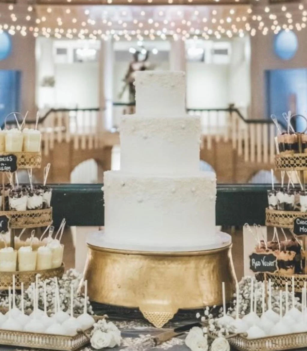 white cake gold stand.jpg