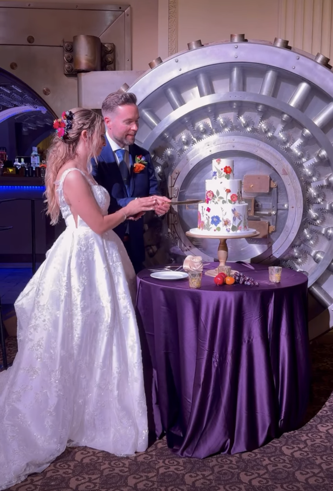 hand-painted floral wedding cake featuring colorful botanical details at the iconic Treasury vault by Sweet Weddings Cakes