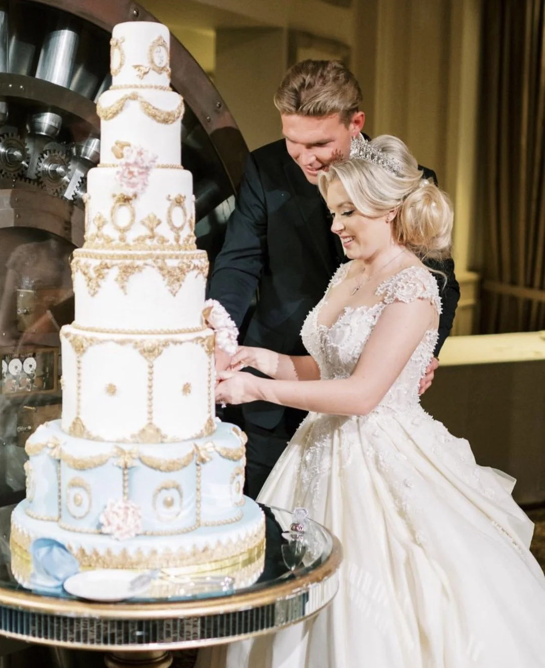 gold-detailed architectural wedding cake at The Treasury on the Plaza St. Augustine by Sweet Weddings Cakes