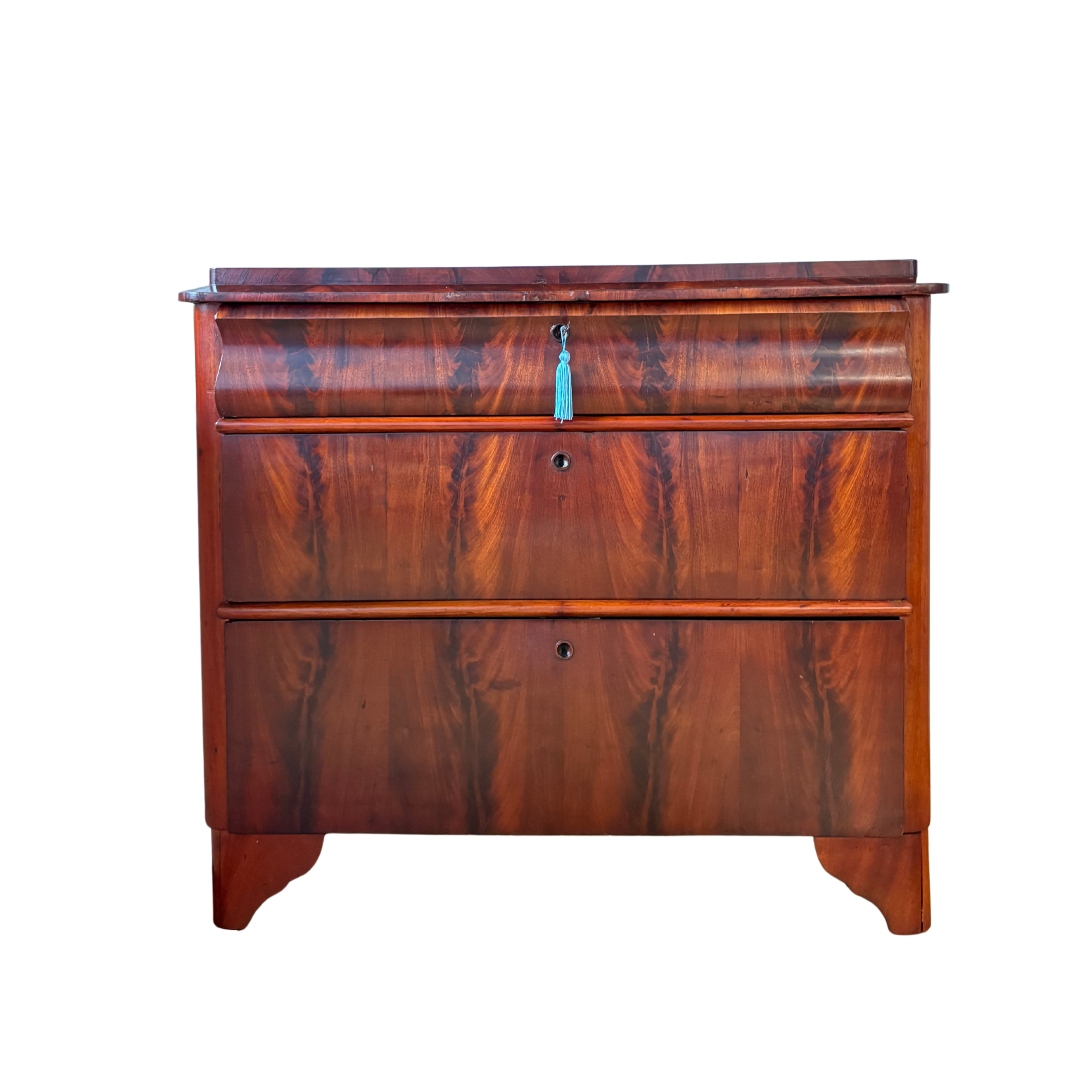 A Small Louis Philippe Commode in Flame Mahogany