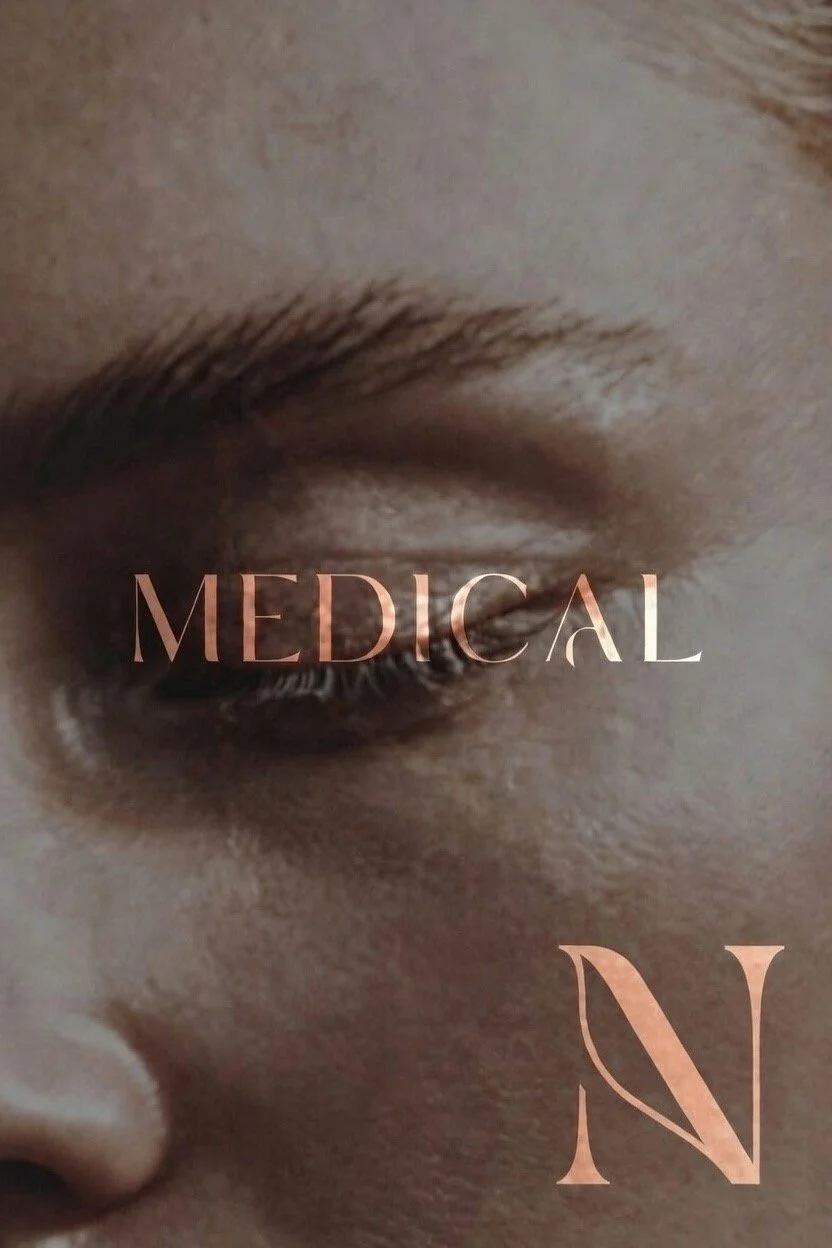 Close-up of a person's eye with the word 'MEDICAL' written across it and 'N' below it in pink text.