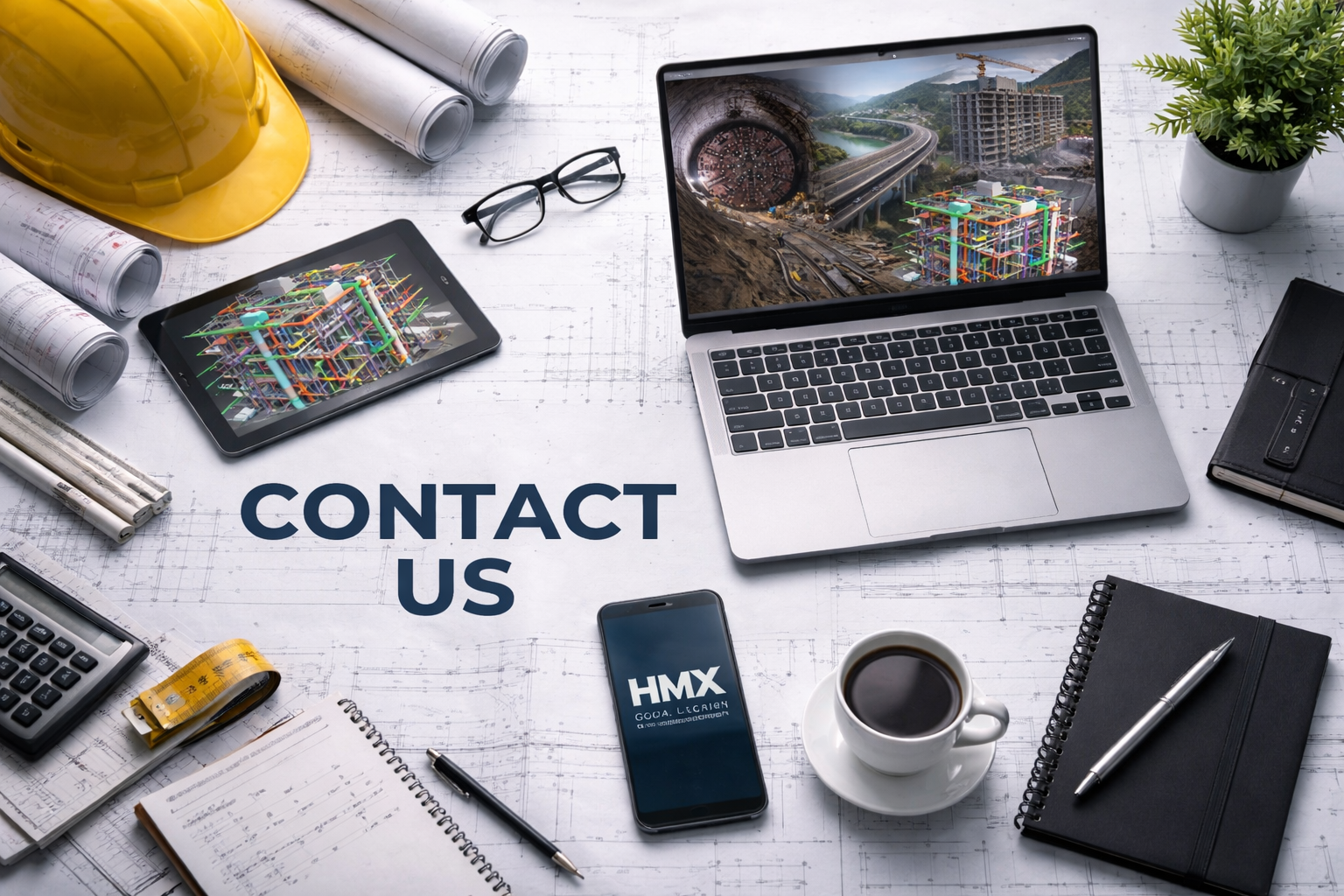 A workspace with blueprint papers, a yellow safety helmet, a tablet, a laptop showing construction sites, glasses, a smartphone, a cup of coffee, notebooks, and a potted plant. The words 'CONTACT US' are written on the paper.