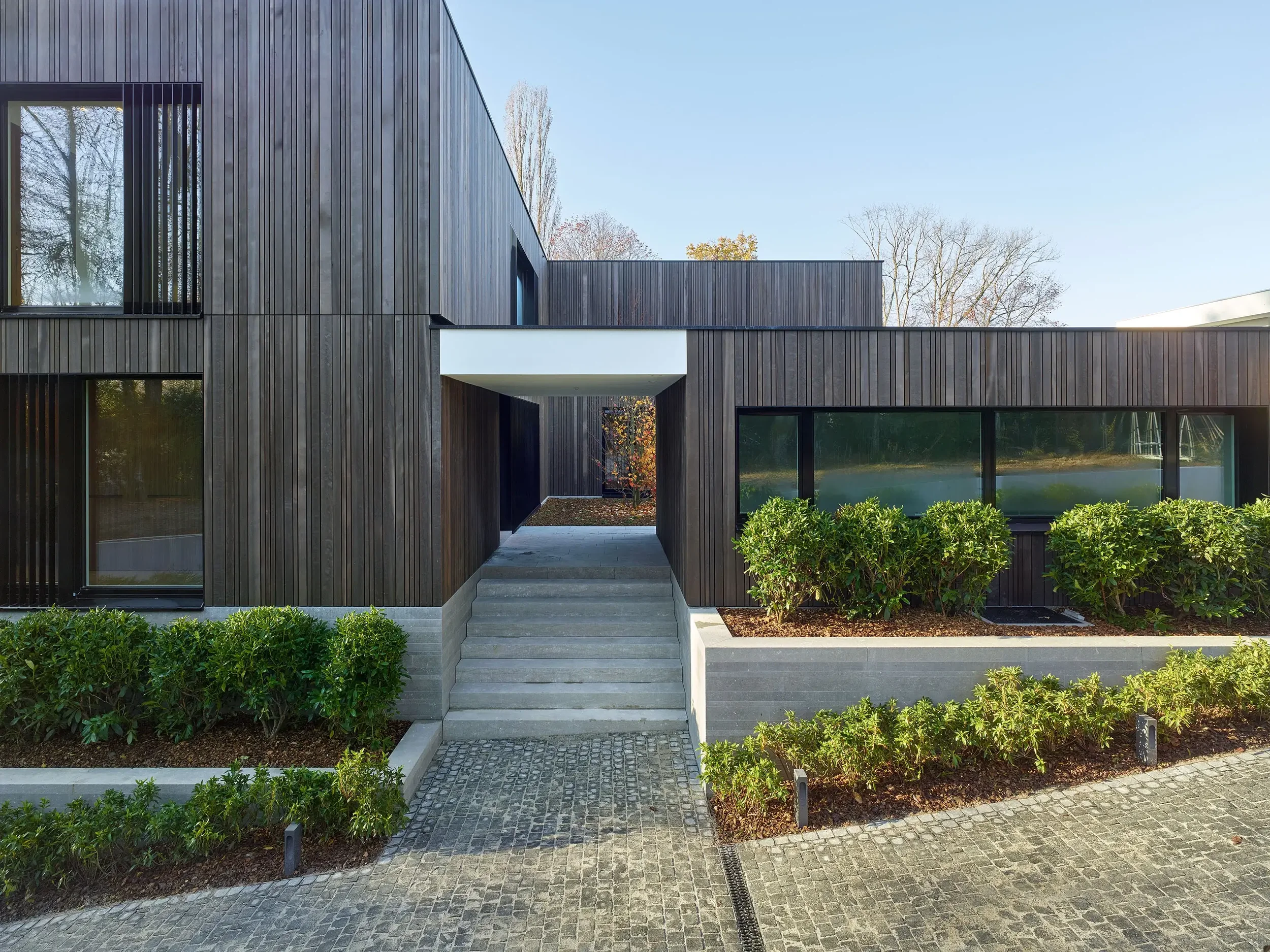 Carneiro_Architectes-2_villas_contigues_Vandoeuvres-002.webp