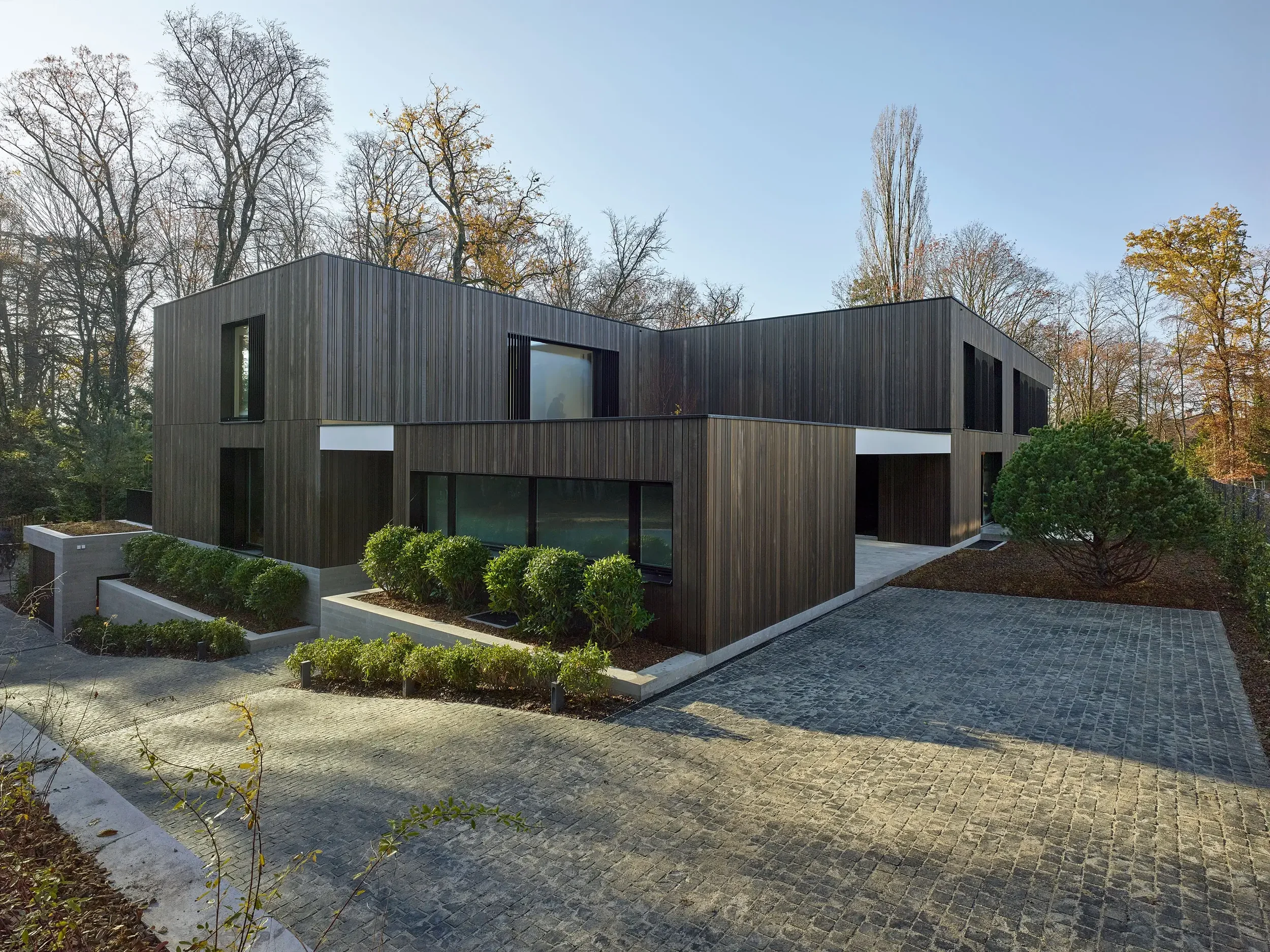 Carneiro_Architectes-2_villas_contigues_Vandoeuvres-001.webp