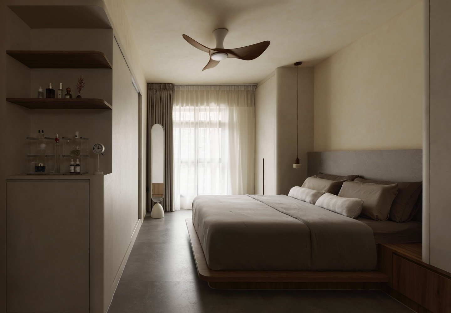 Project KANSO 「简」 
Type: 4 ROOM BTO

Storage, but make it symmetrical. We traded the typical corner L-shape for a &ldquo;his and hers&rdquo; layout that anchors the room. Soft curves, muted limewash, and warm walnut accents come together to create a 