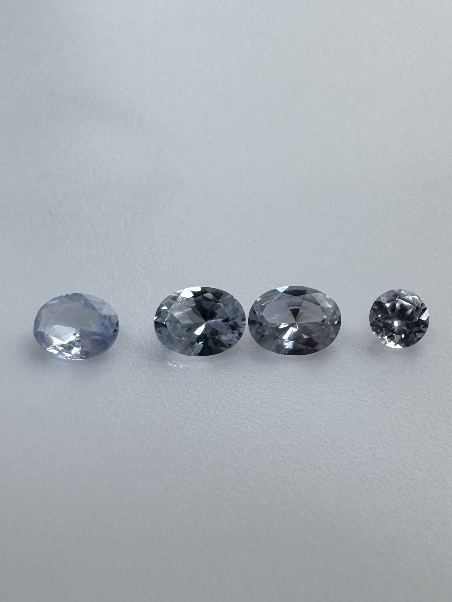 Ceylon Sapphire (No Heat), Gray and Blue Shades, Round Cut Rose Flat: 3.0 and 2.5, Round Cur Star Cut: 3.0 and 2.5, Oval Cut: 5 x 3 and 4 x 3, Octagone Cut 4 x 2