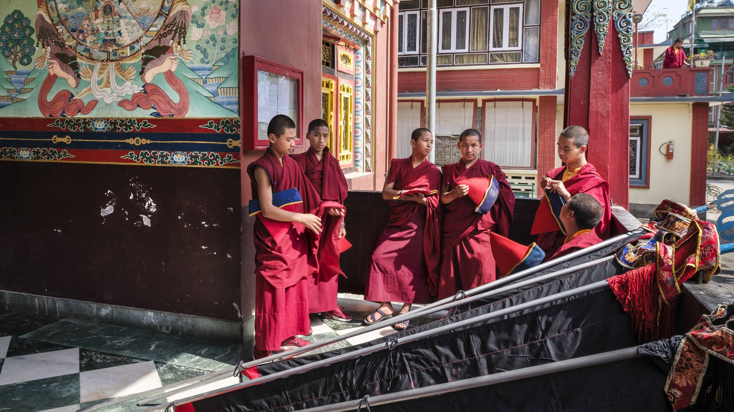Young monks gathering and preparing for ritual activities during Gutor Chenmo at Pal Dilyag Monastery in Kathmandu.