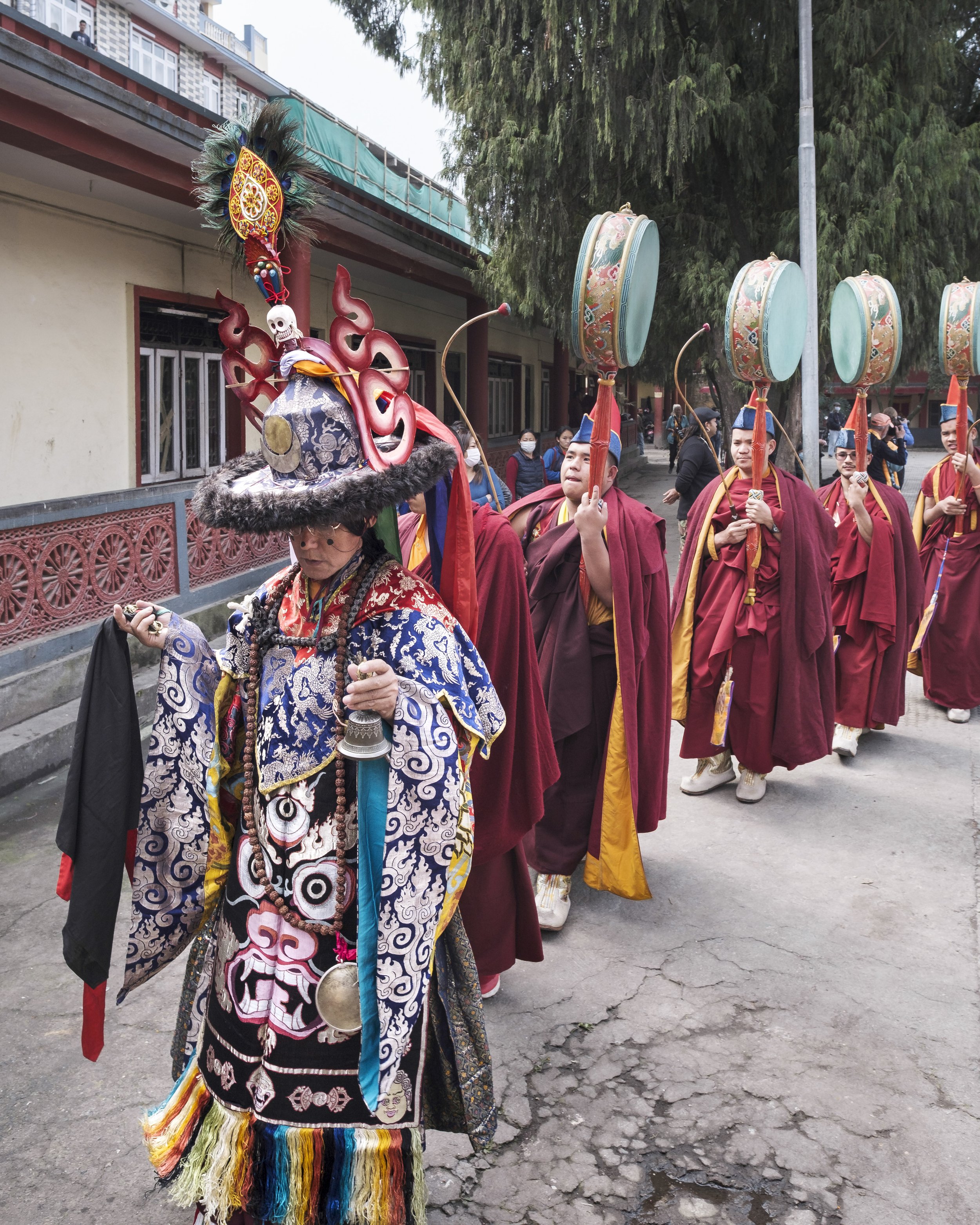 Vajra Master leading monks in ceremonial procession during Gutor Chenmo ritual at Pal Dilyag Monastery in Kathmandu.