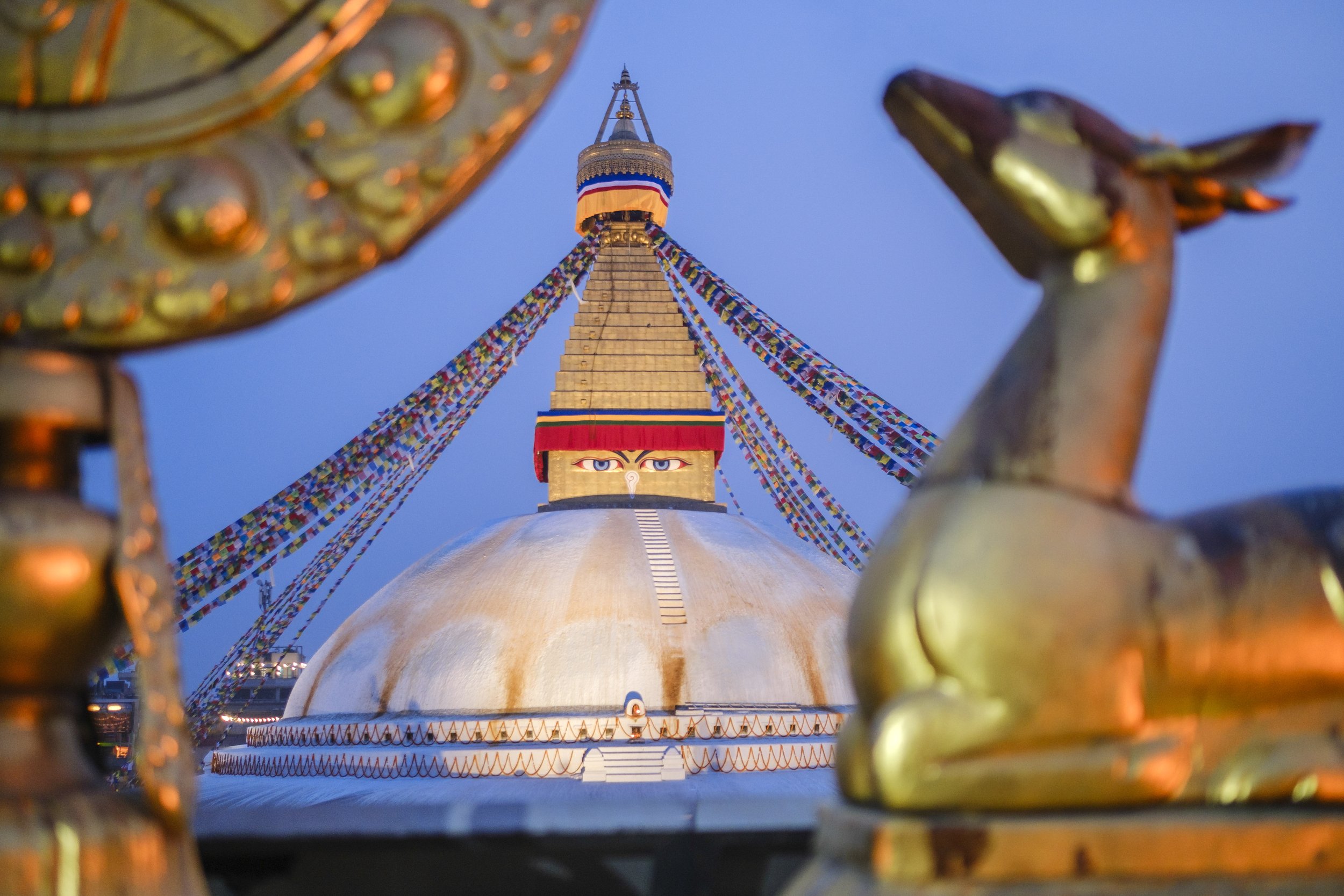 Boudhanath Stupa in Kathmandu with prayer flags, one of the most sacred Buddhist sites near Pal Dilyag Monastery.