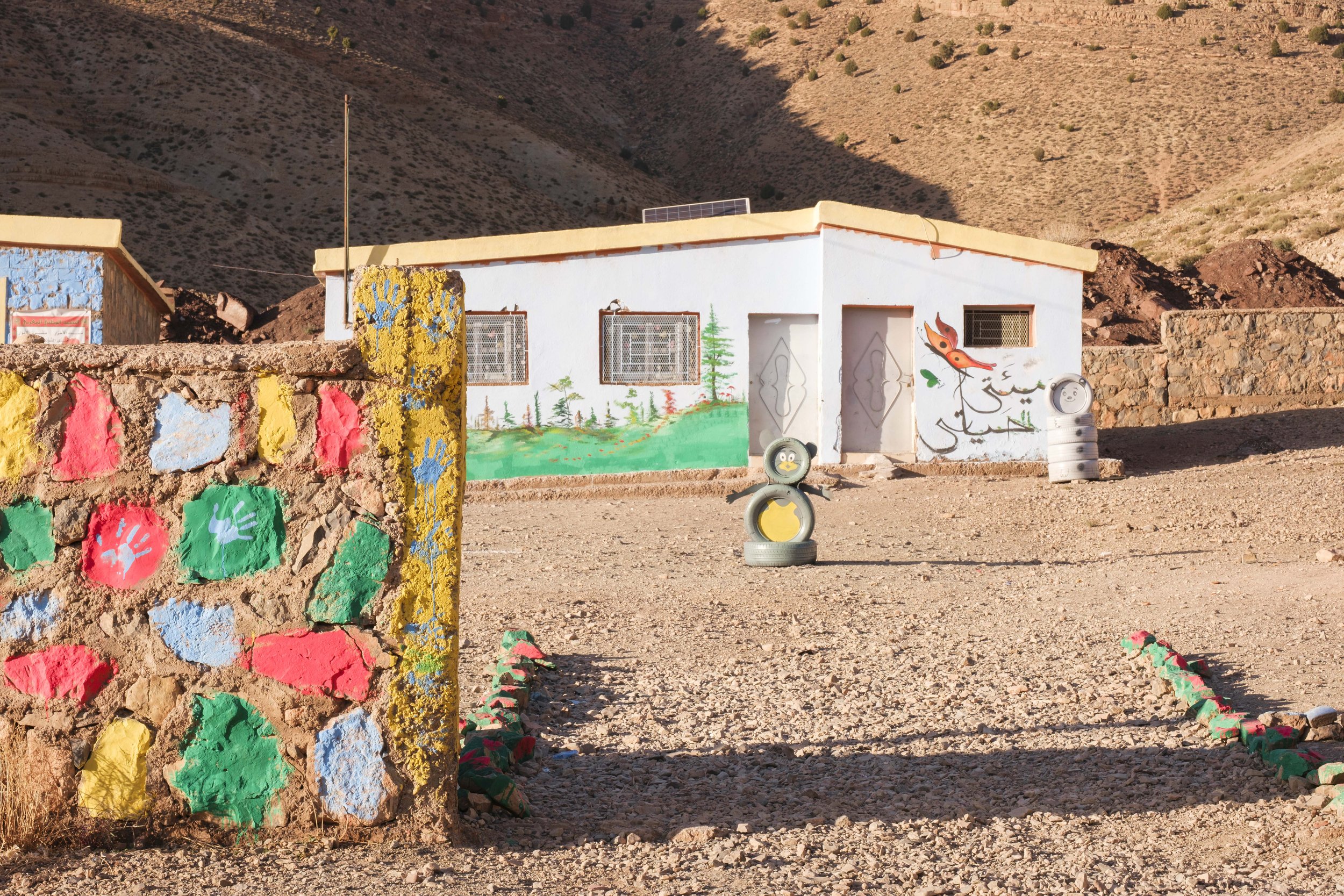 Small rural school decorated with colorful murals in a village in Morocco’s High Atlas Mountains.