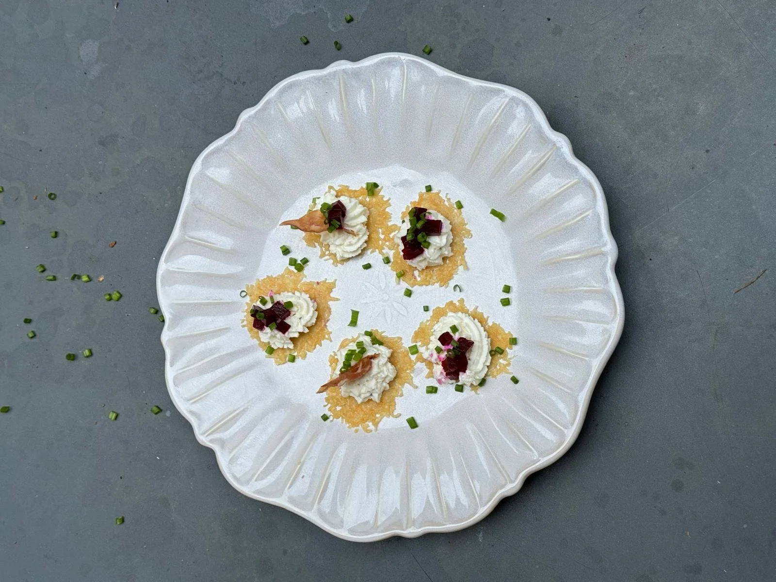 Parmesan crisps with pickled beetroot and whipped goats’ cheese