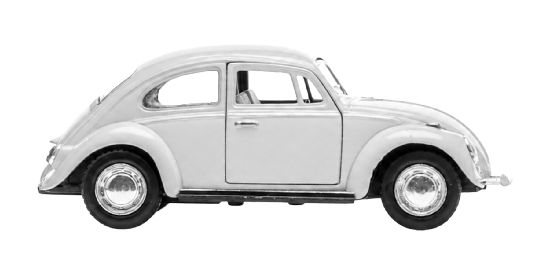 Black and white photograph of a vintage car viewed from the side.