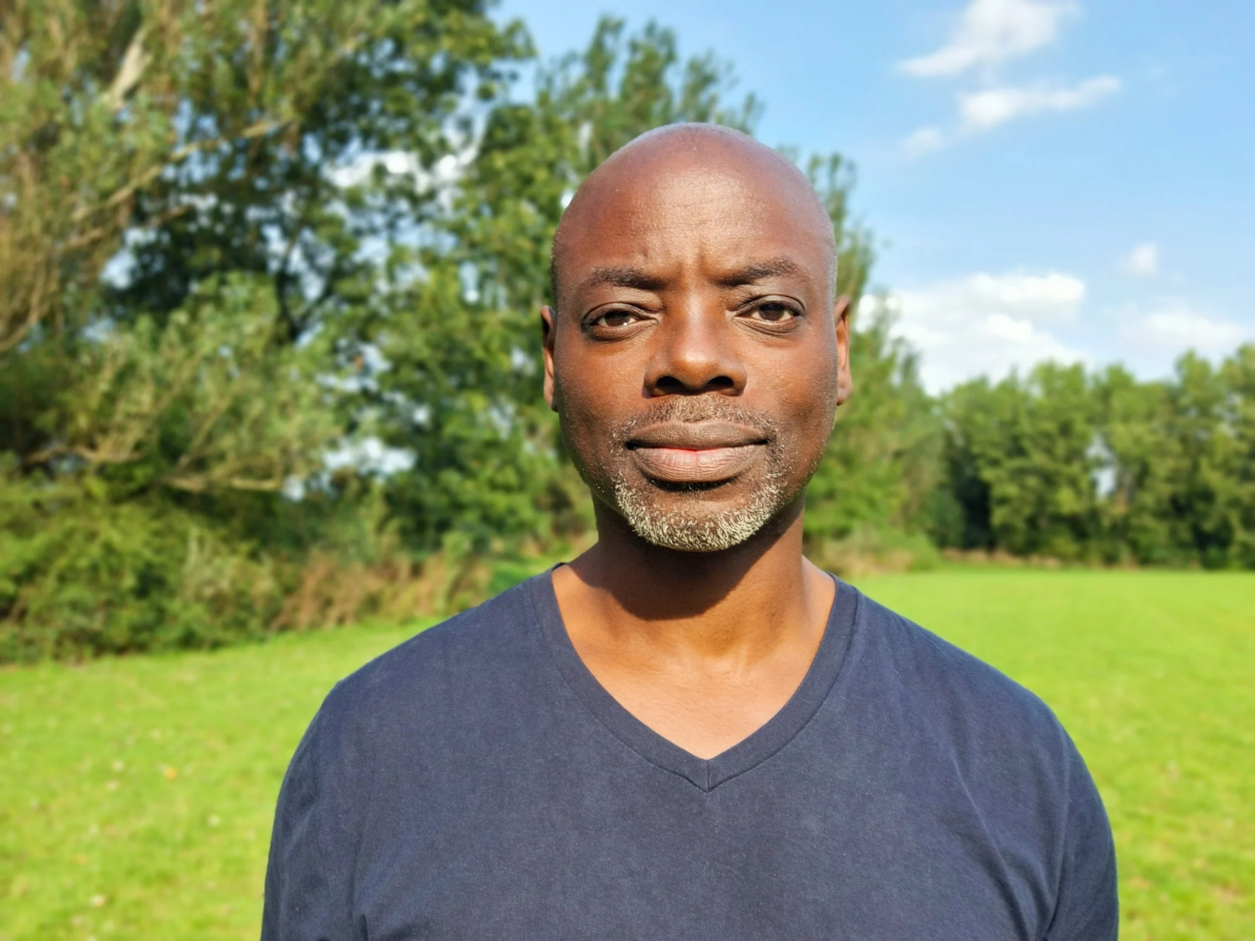 Portrait photograph of Adrian Cox