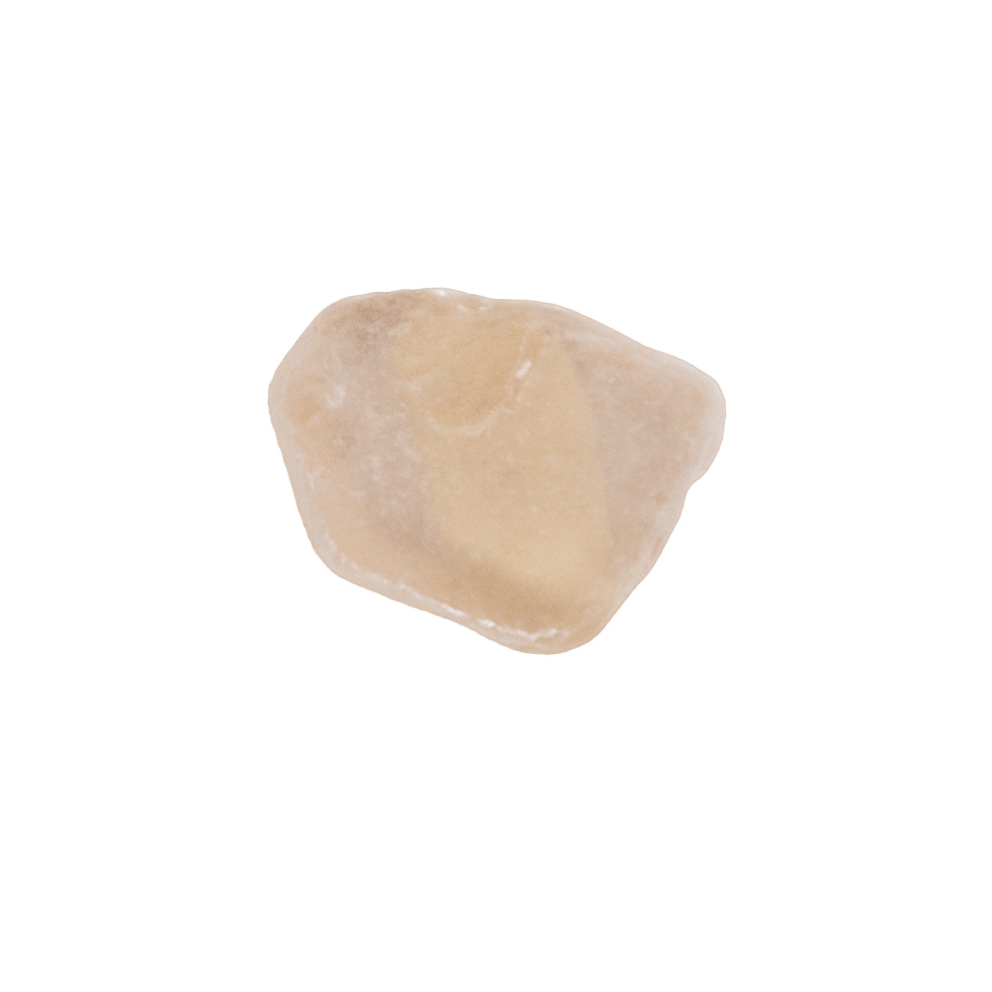 Close-up of a piece of light-colored sea glass from Brittany, France