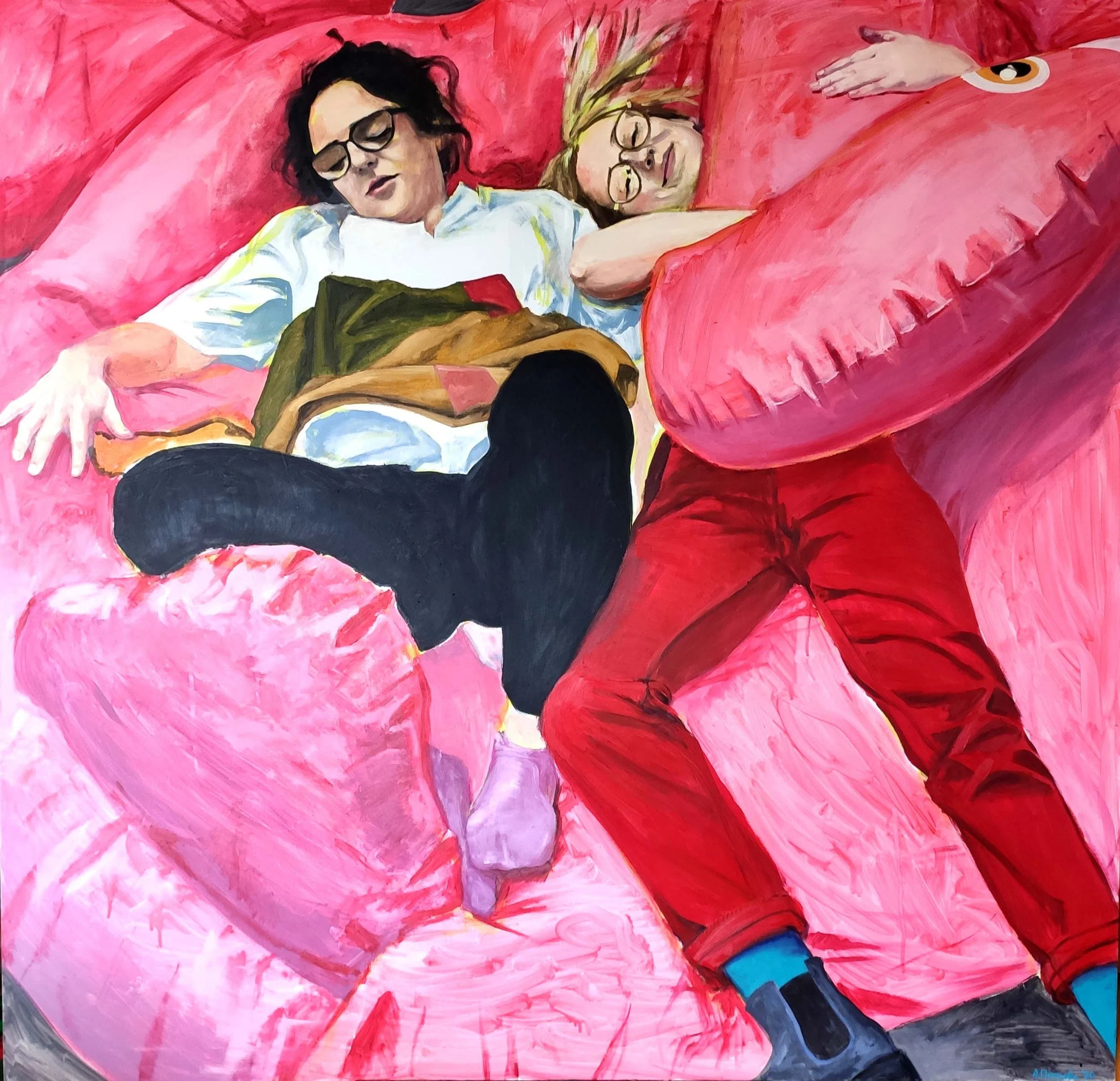 Painting of two women sleeping on a pink bed with large pink pillows. One woman with dark hair and glasses is wearing a white shirt and is lying on her back. The other woman with blonde hair and glasses is lying on her side, resting her head on a pillow. A large pink arm or pillow shades her legs.
