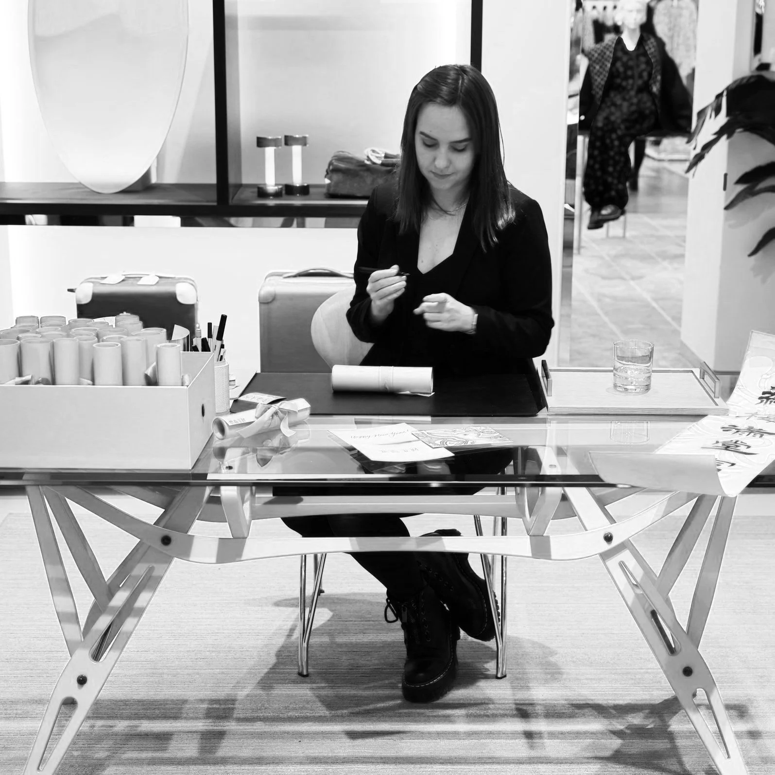 Linda Röhrich working at a boutique luxury personalization event