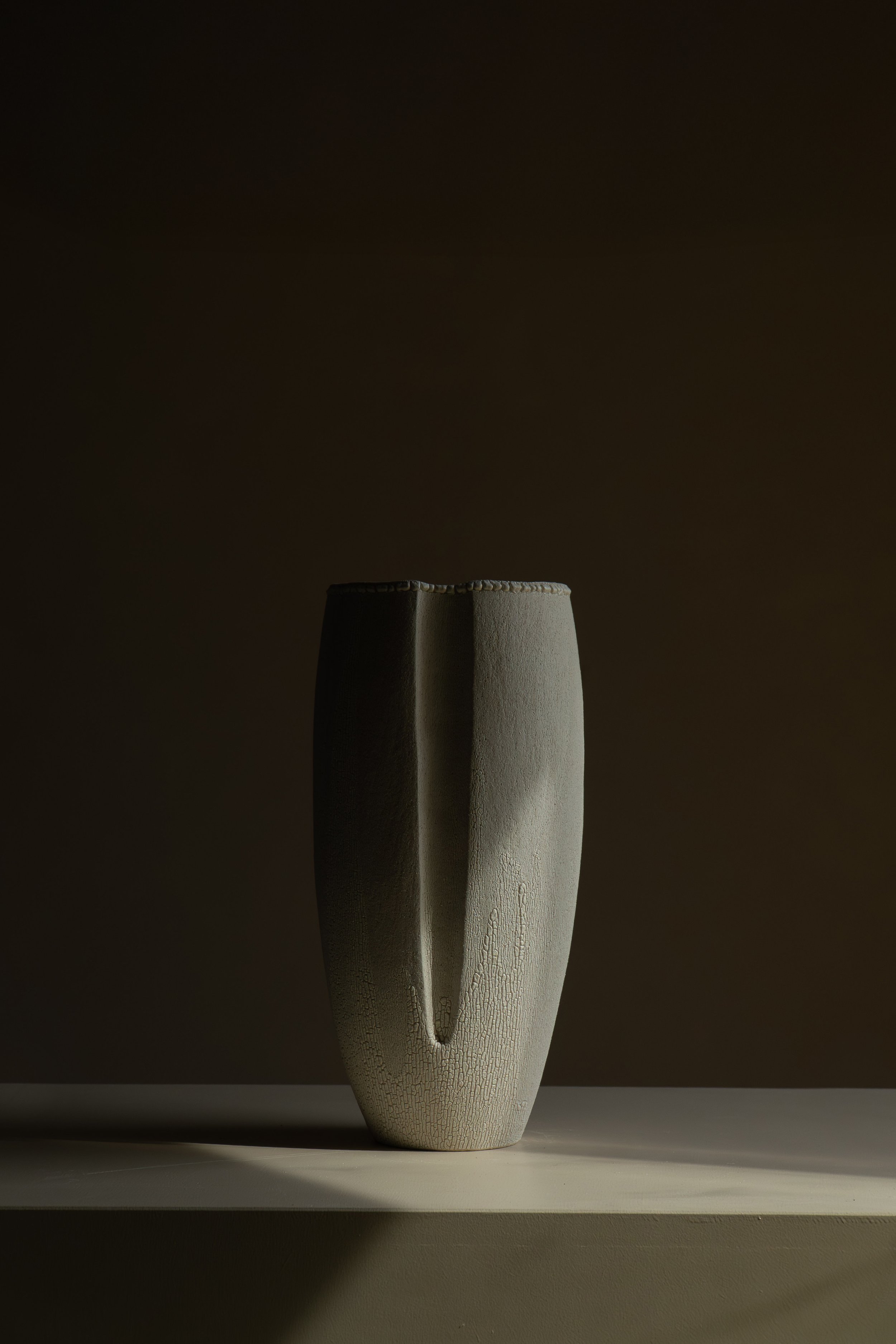 TALL FACETED VASE