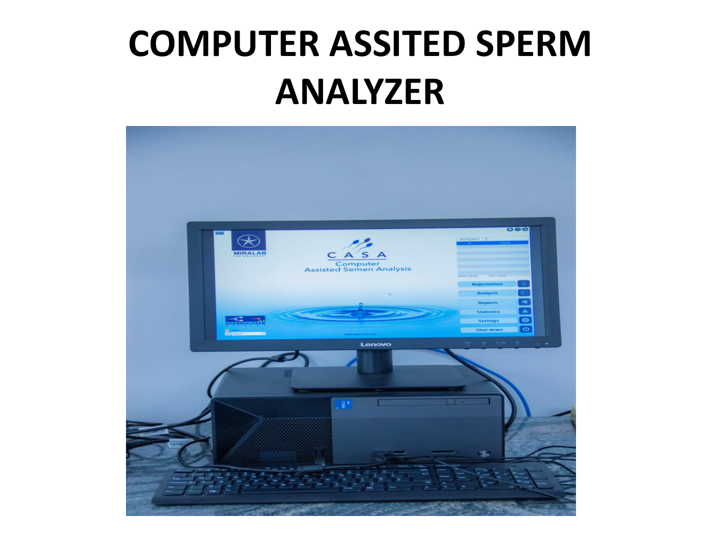 Computer setup with monitor displaying CASIA Computer Assisted Semen Analysis software, keyboard, and desktop computer on a table.