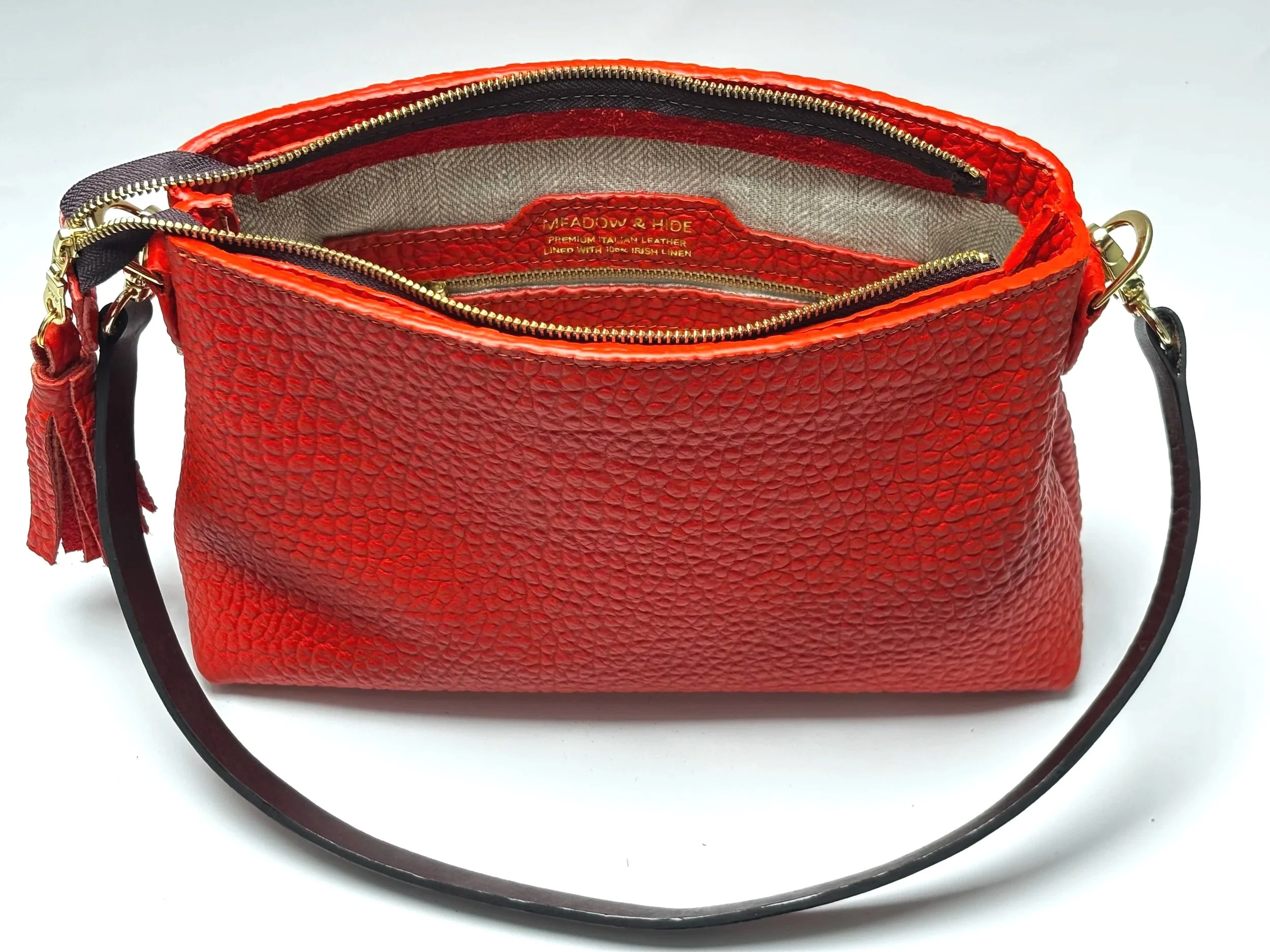 Meadow+%26+Hide+linen+lining+and+interior+pocket+of+orange+leather+bag.jpg
