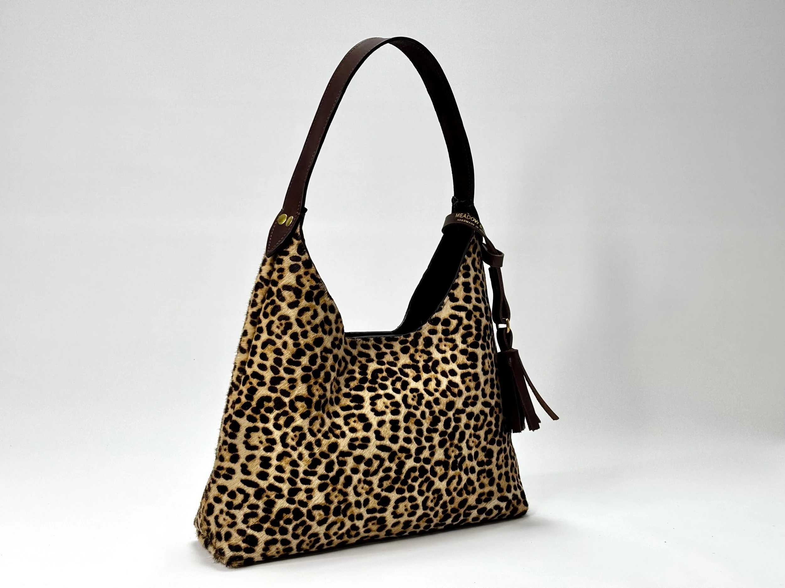 Meadow and Hide hair on leopard print hobo 2.jpeg