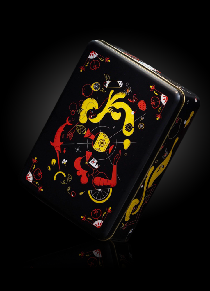 A black tin box decorated with traditional Sicilian motifs, full of local specialities.