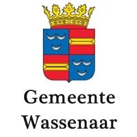Het beeld toont het wapen van de gemeente Wassenaar met onder de tekst 'Gemeente Wassenaar'.