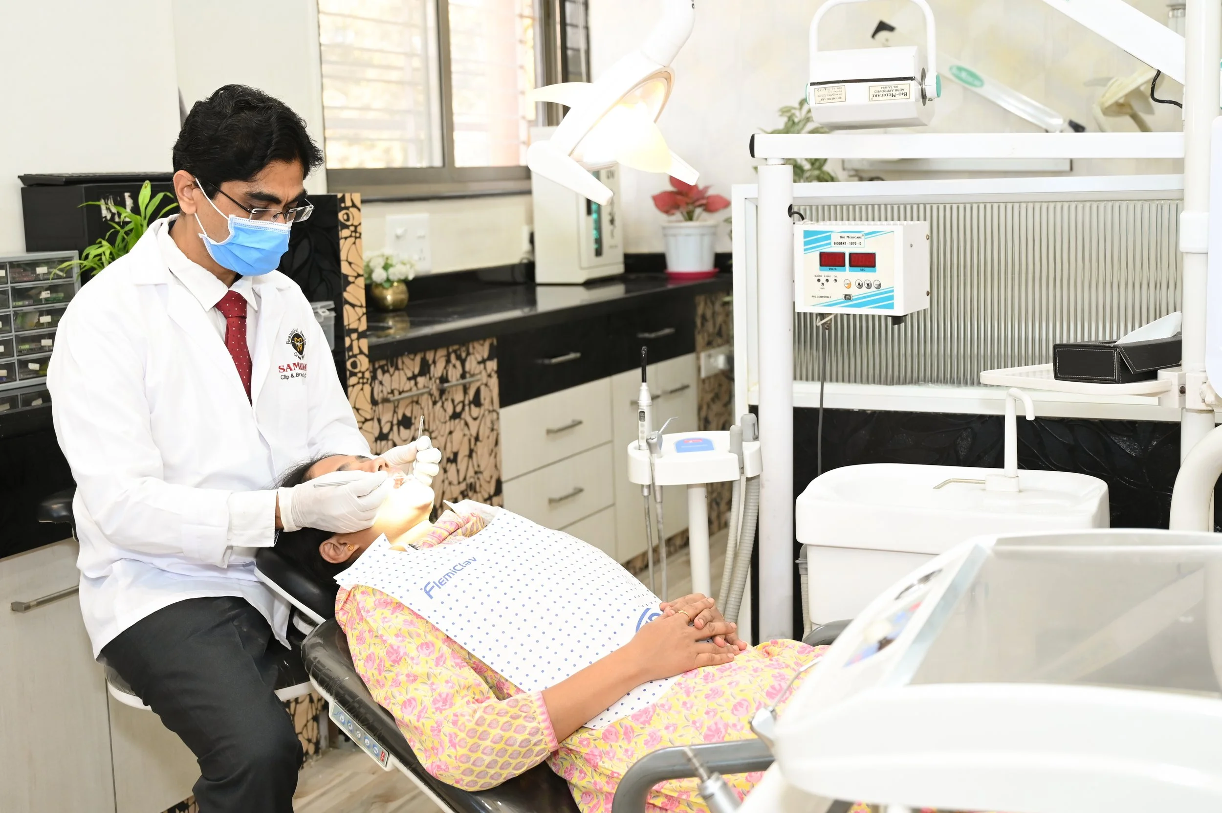 dr-prasad-gayake-inspecting-a-patient