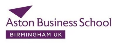 A logo for Aston Business School in Birmingham, UK, featuring a purple triangular symbol and text in purple and black.