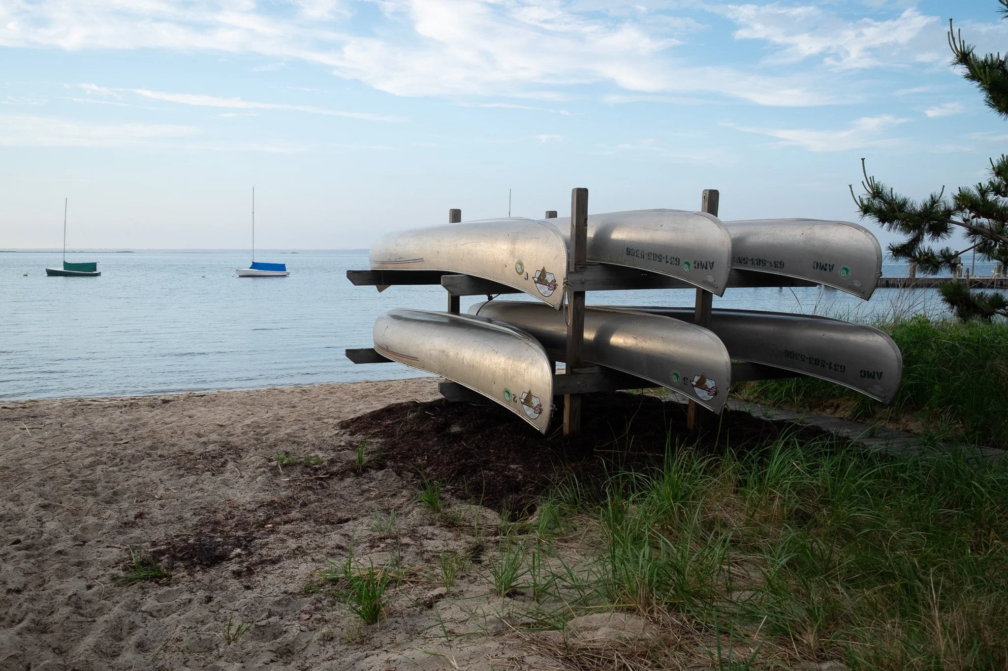 Several canoes in front of the becah