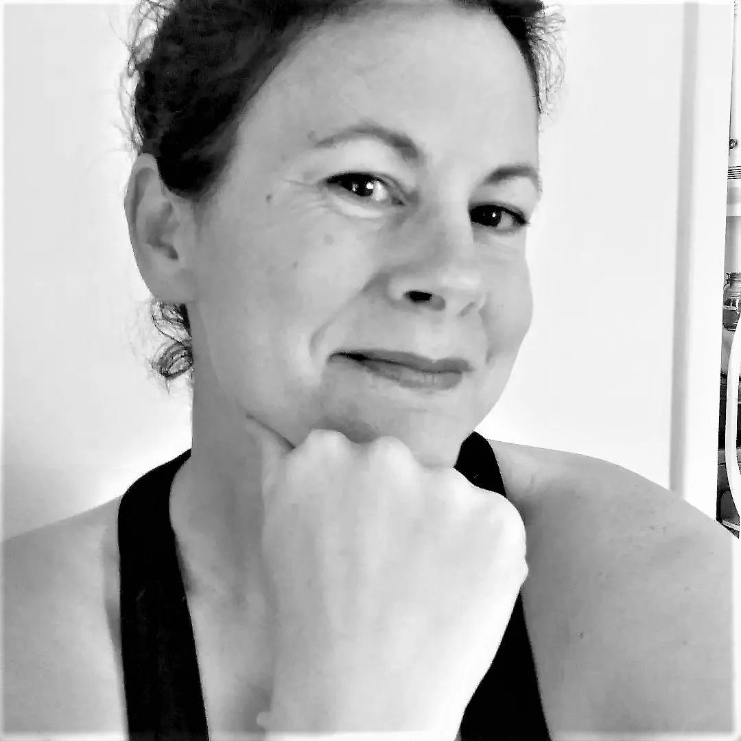 Black and white portrait of Michigan artist Erin Wilson.