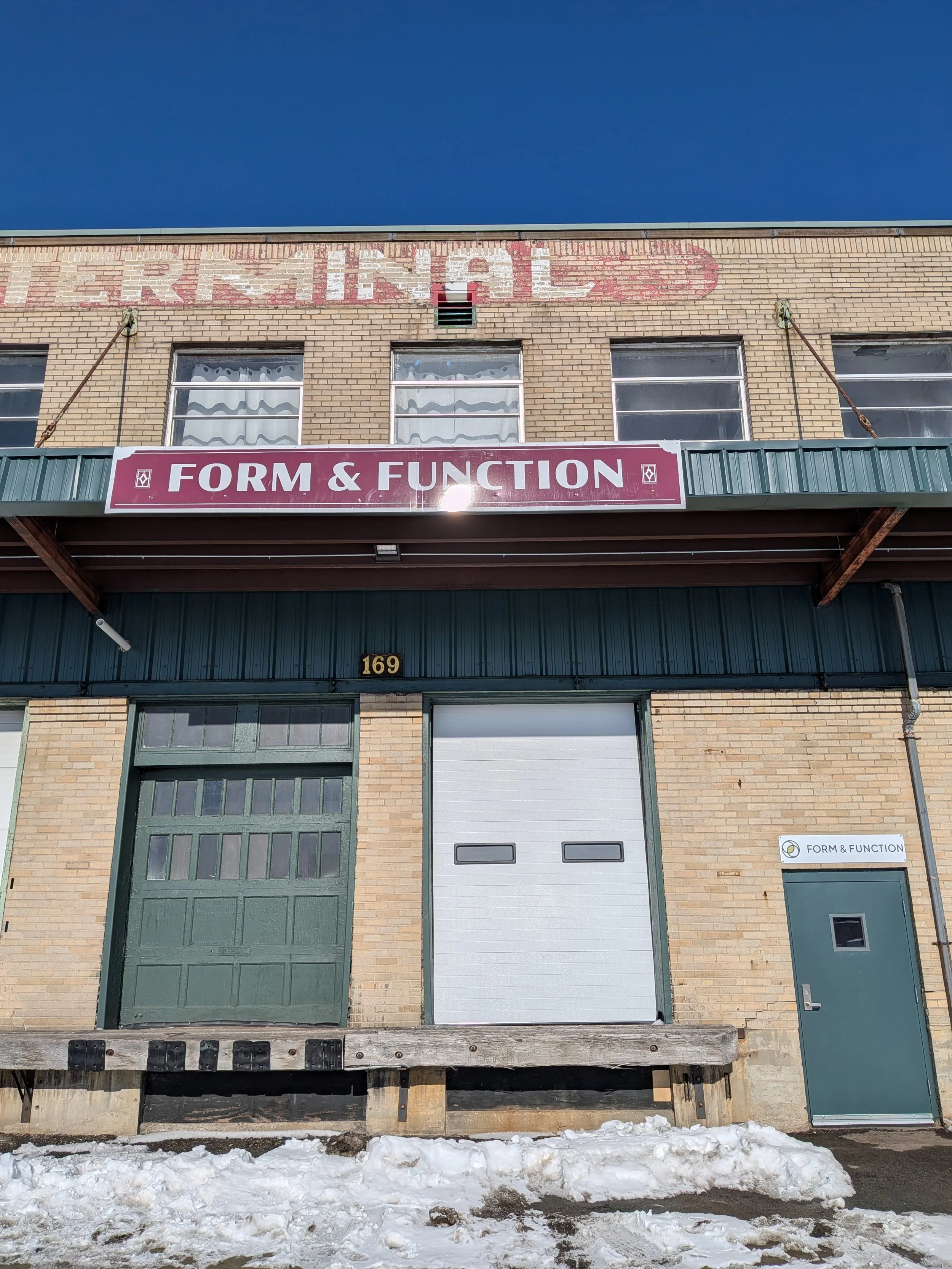 Main entrance of Form and Function Pilates as seen from Clinton Street in Buffalo New York. Form and Function offers small group reformer Pilates classes.