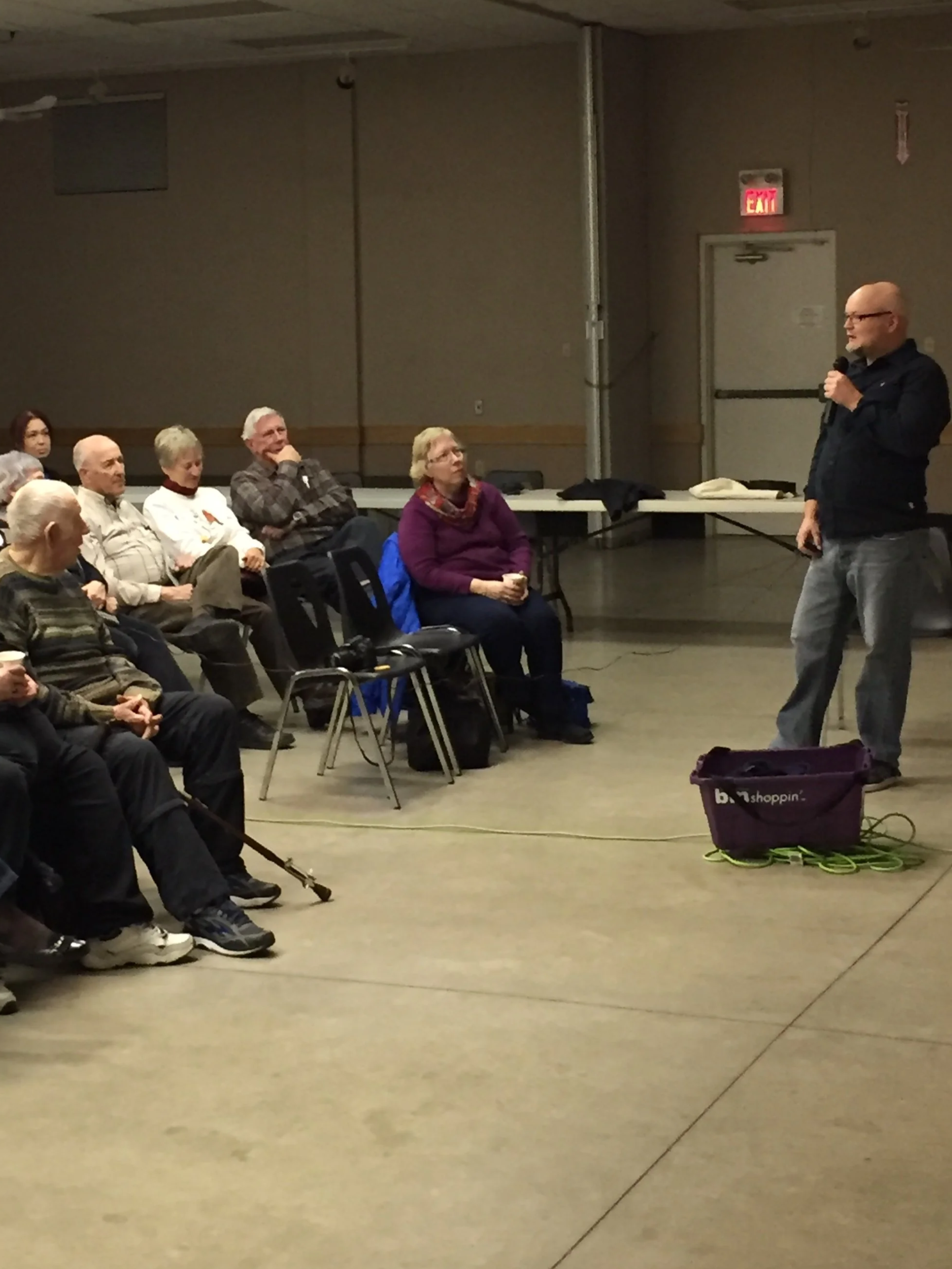 Terry Parker speaking to nature club audience about 30 year photo career