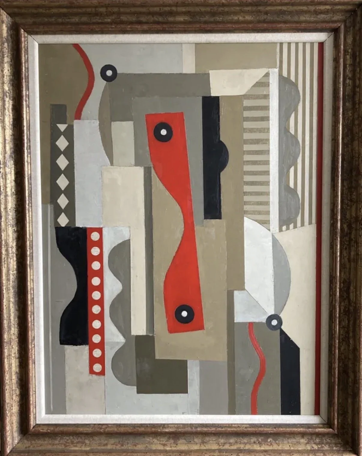 Abstract geometric painting with shapes and patterns in gray, black, white, beige, and red, framed in wood.
