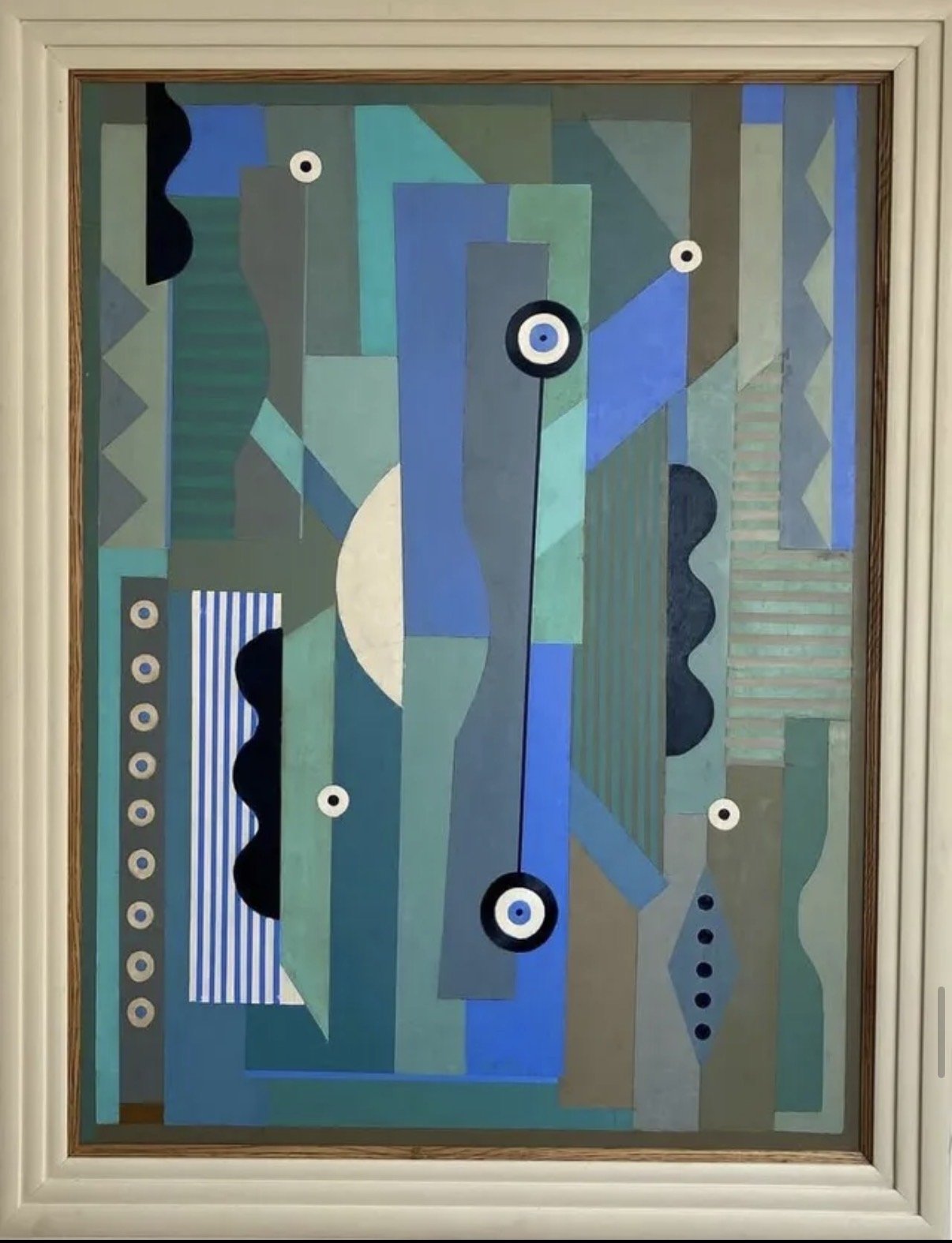 An abstract painting with geometric shapes and patterns in shades of blue, green, gray, black, and white, framed in a wooden frame.