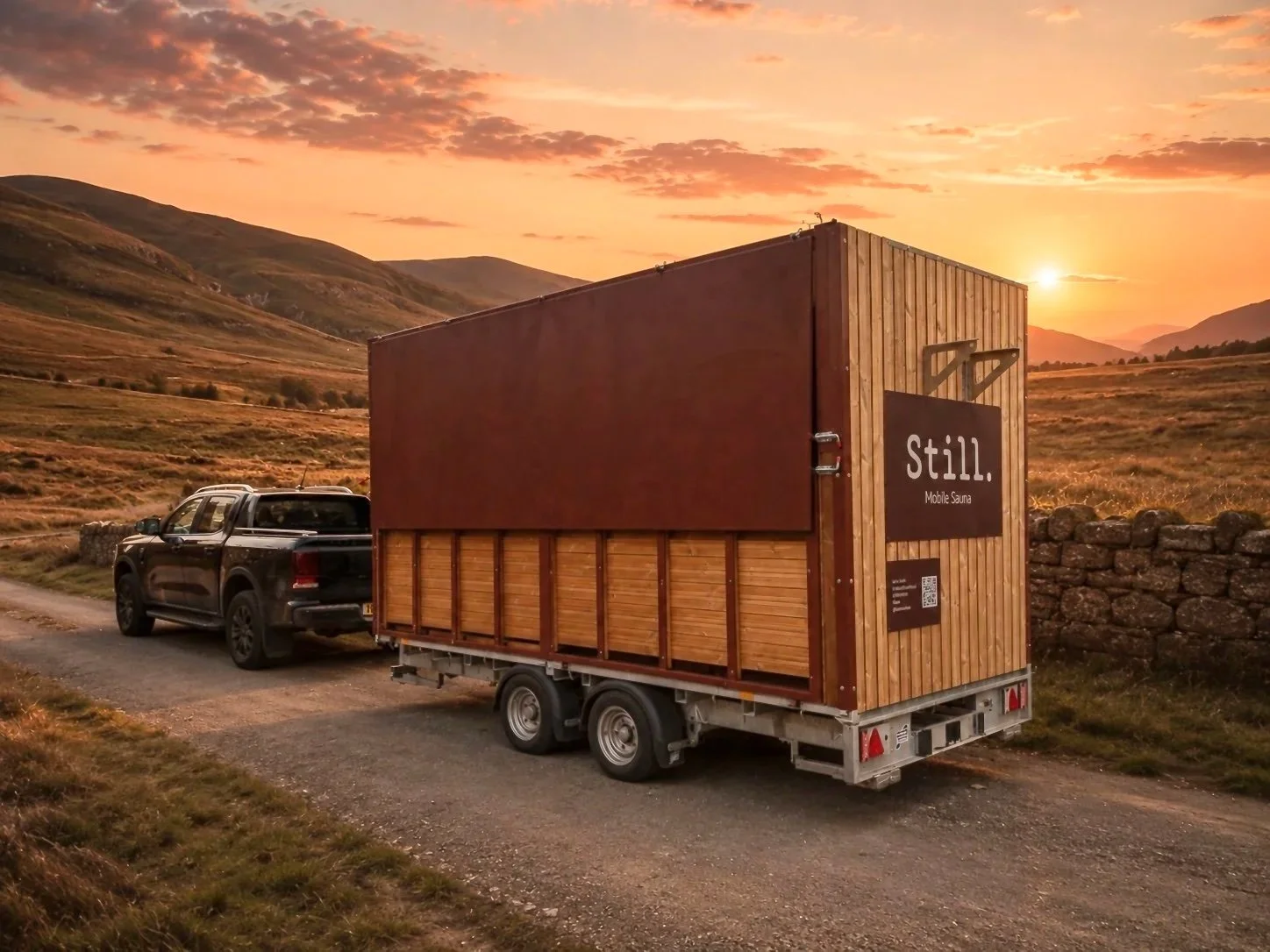 Mobile Sauna trailer in scotland, image of still wellness sauna trailer driving through roads on wild scottish highlandss